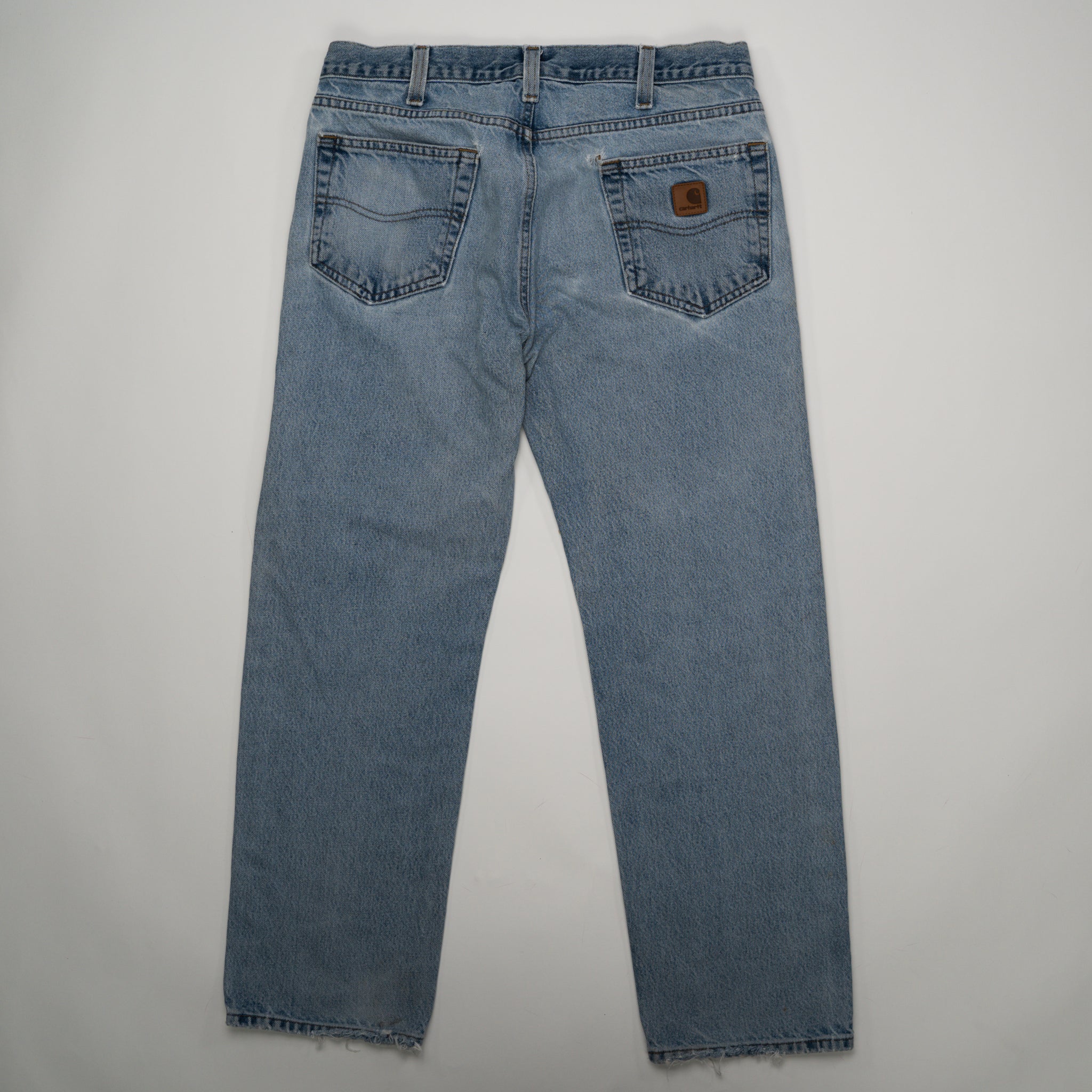 Vintage Carhartt Light Washed Ripped Jeans (34 x 30) | Rebalance Vintage.