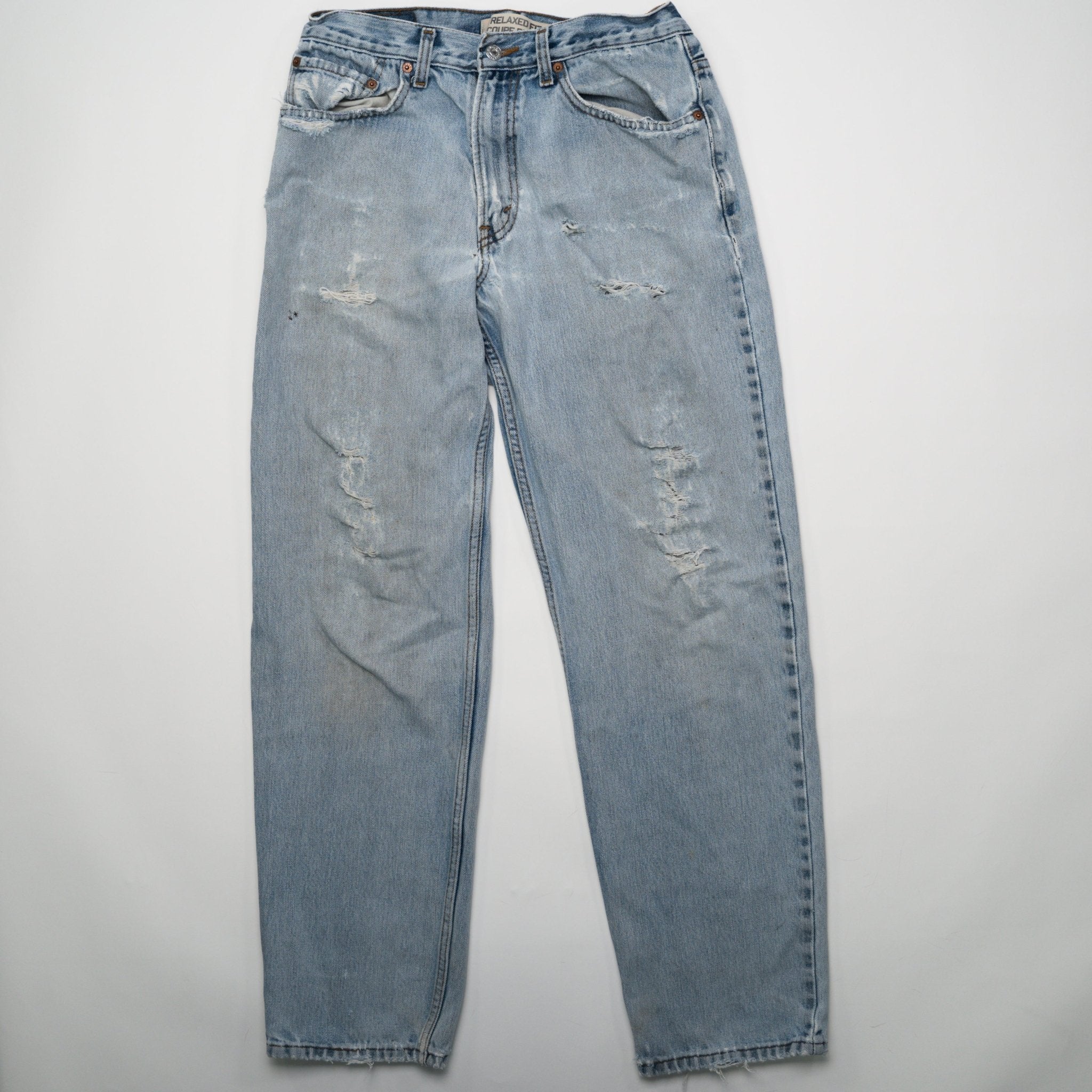 Vintage Light Washed Ripped Levi Jeans (32 x 31) | Rebalance Vintage.