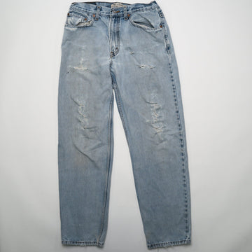 Vintage Light Washed Ripped Levi Jeans (32 x 31) | Rebalance Vintage.