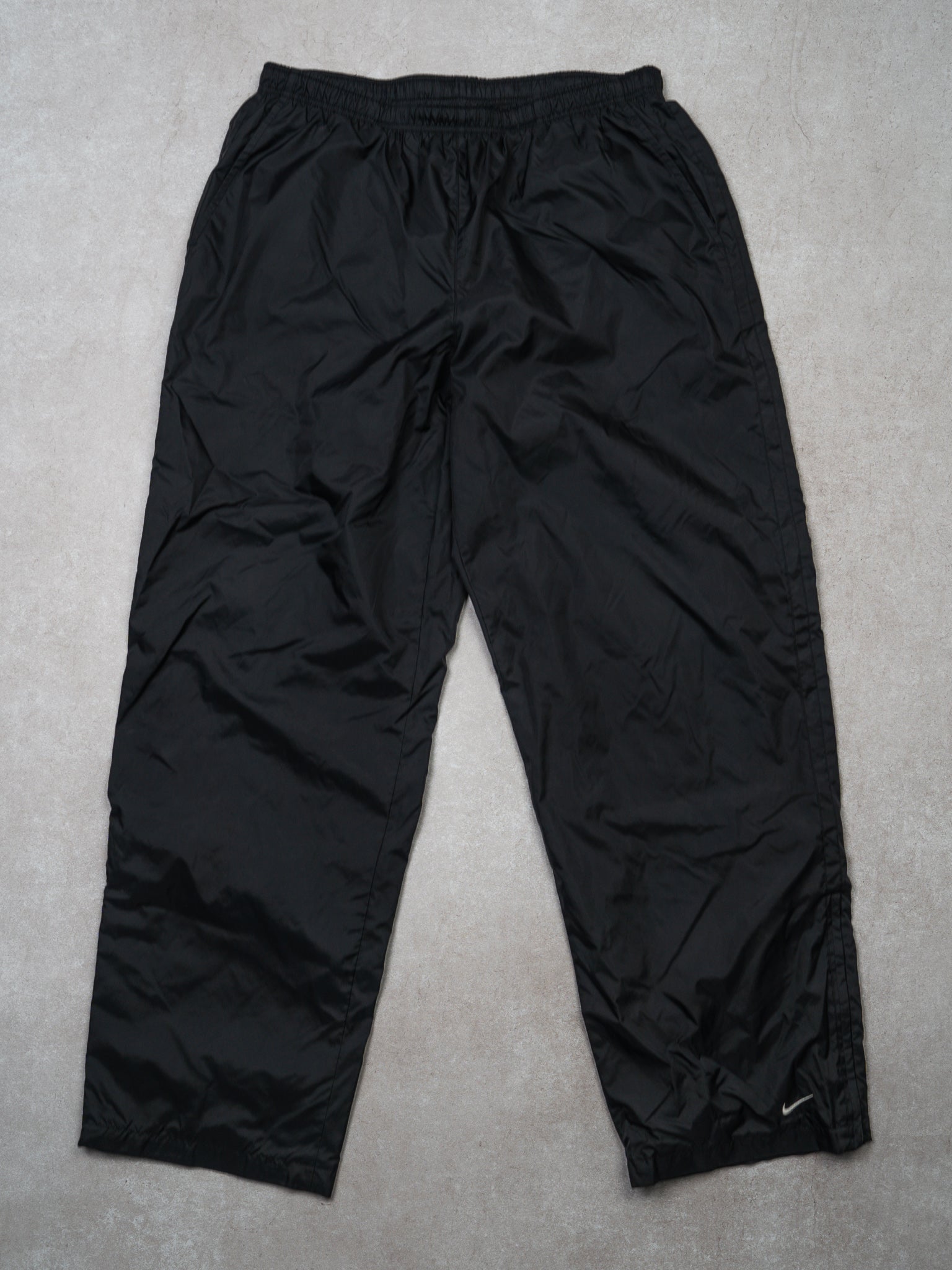 Vintage Black Nike Swoosh Windbreaker Pants (L)