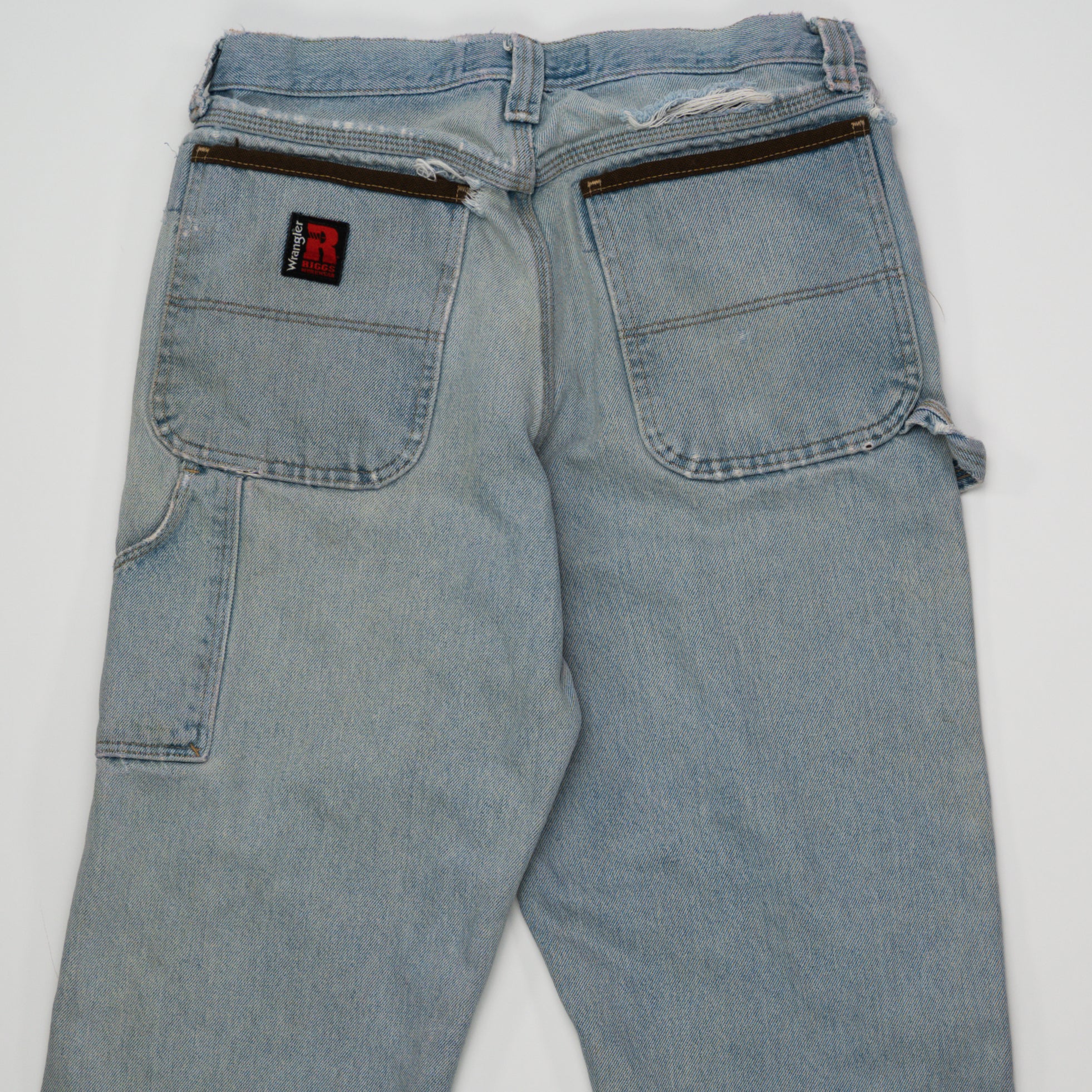 Vintage light washed Wrangler Riggs Workwear Jeans (34) | Rebalance Vintage.