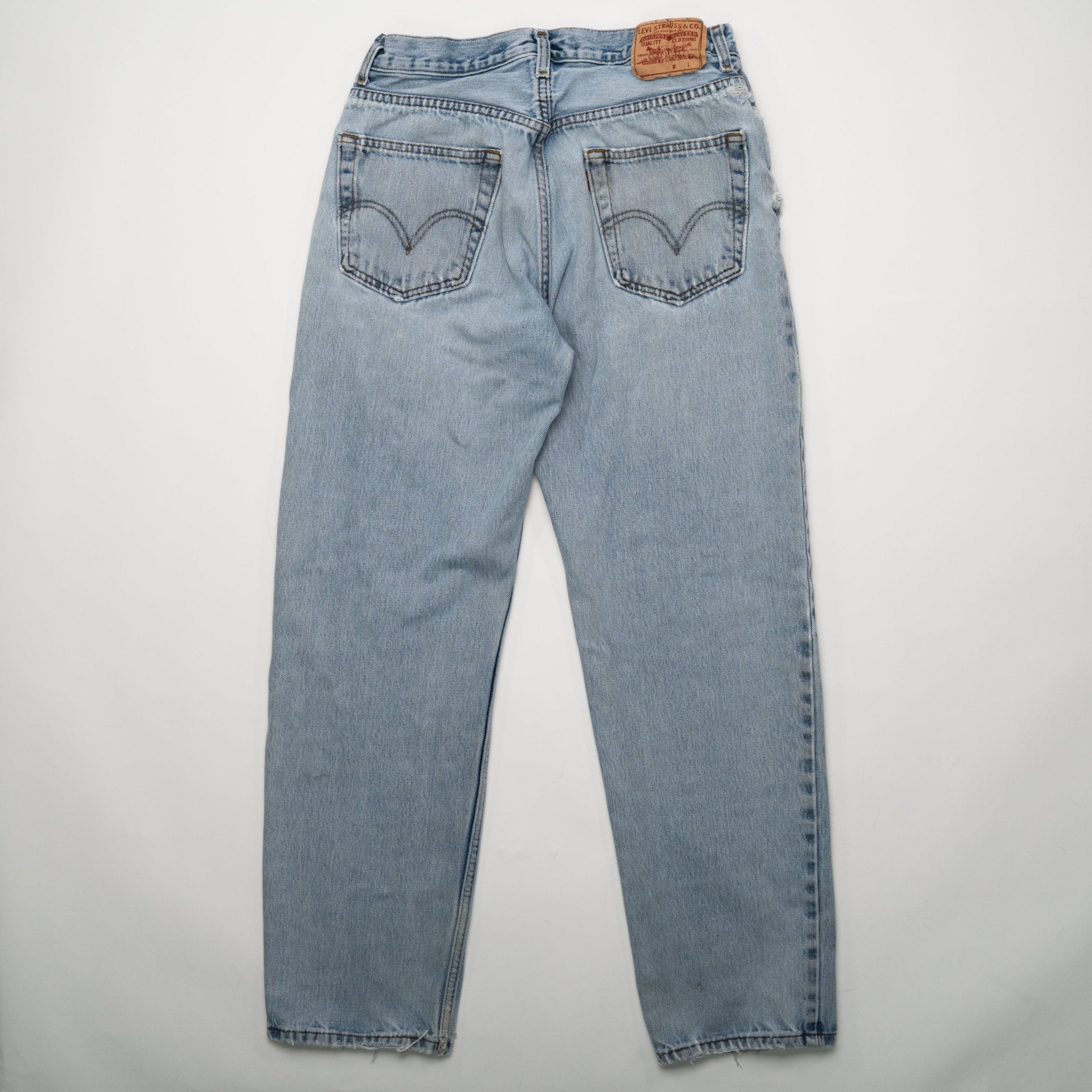 Vintage Light Washed Ripped Levi Jeans (32 x 31) | Rebalance Vintage.