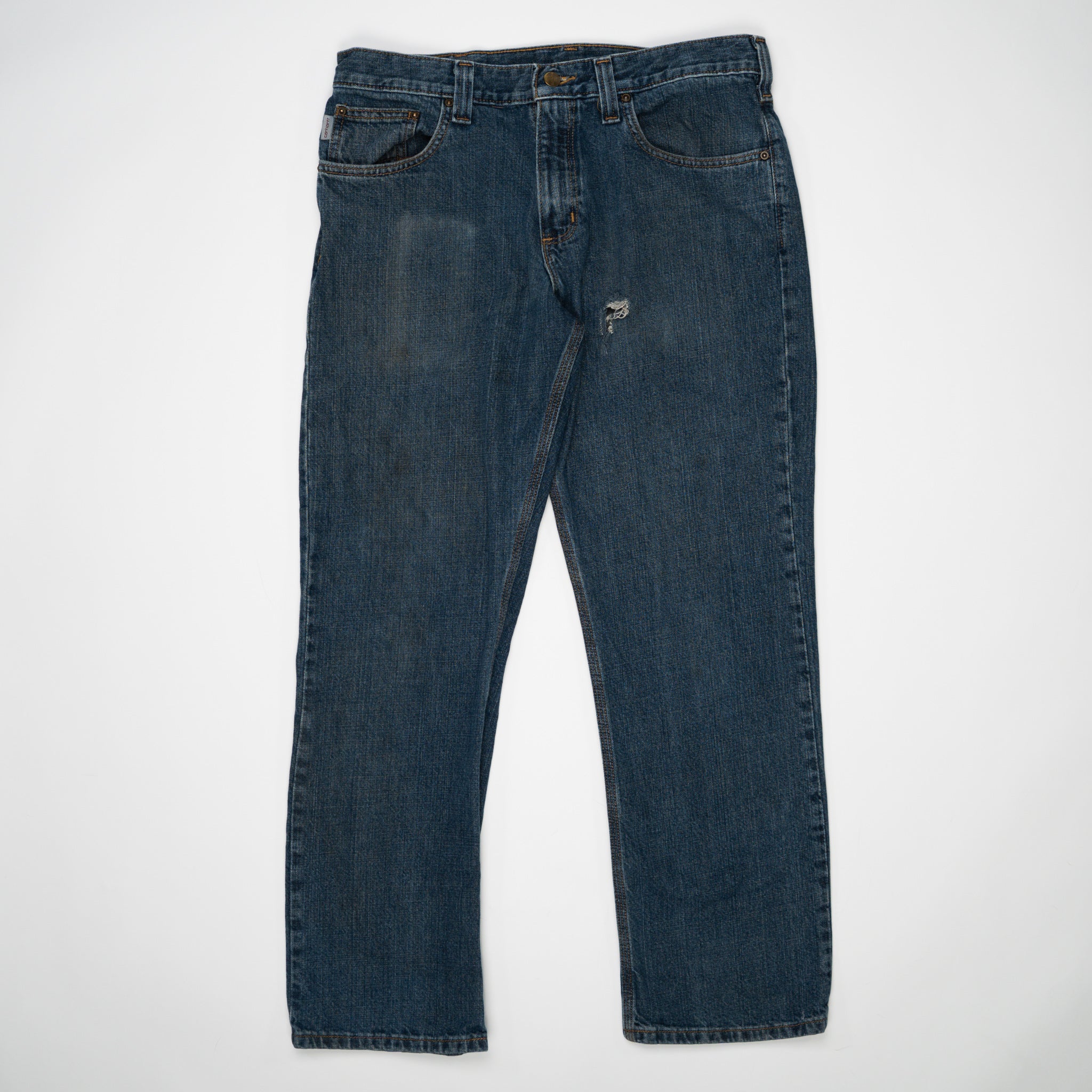 Vintage Dark Blue Carharrt Jeans w/ Rip (32) | Rebalance Vintage.