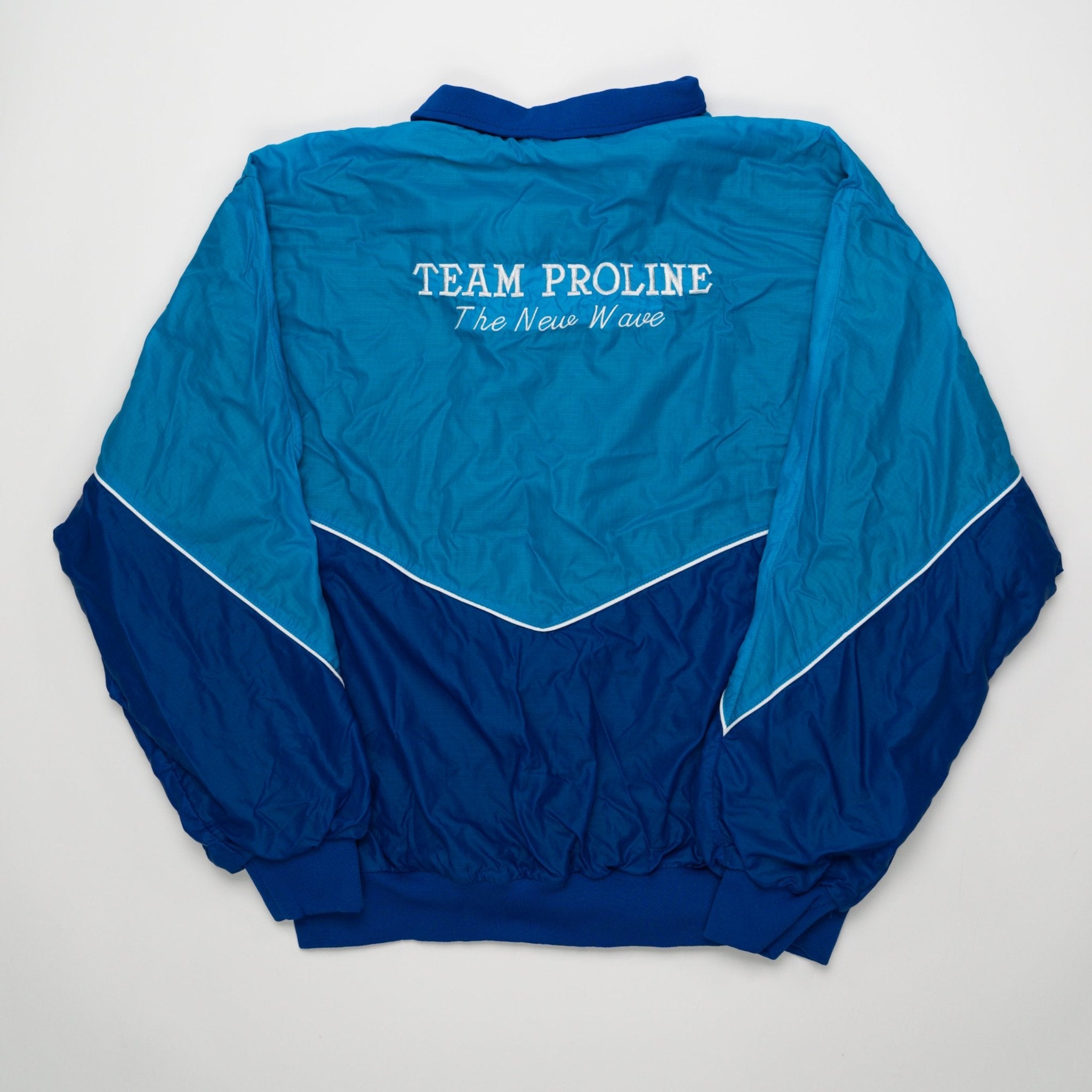 Vintage Blue Team Proline 'The New Wave' Jacket (XL) | Rebalance Vintage.
