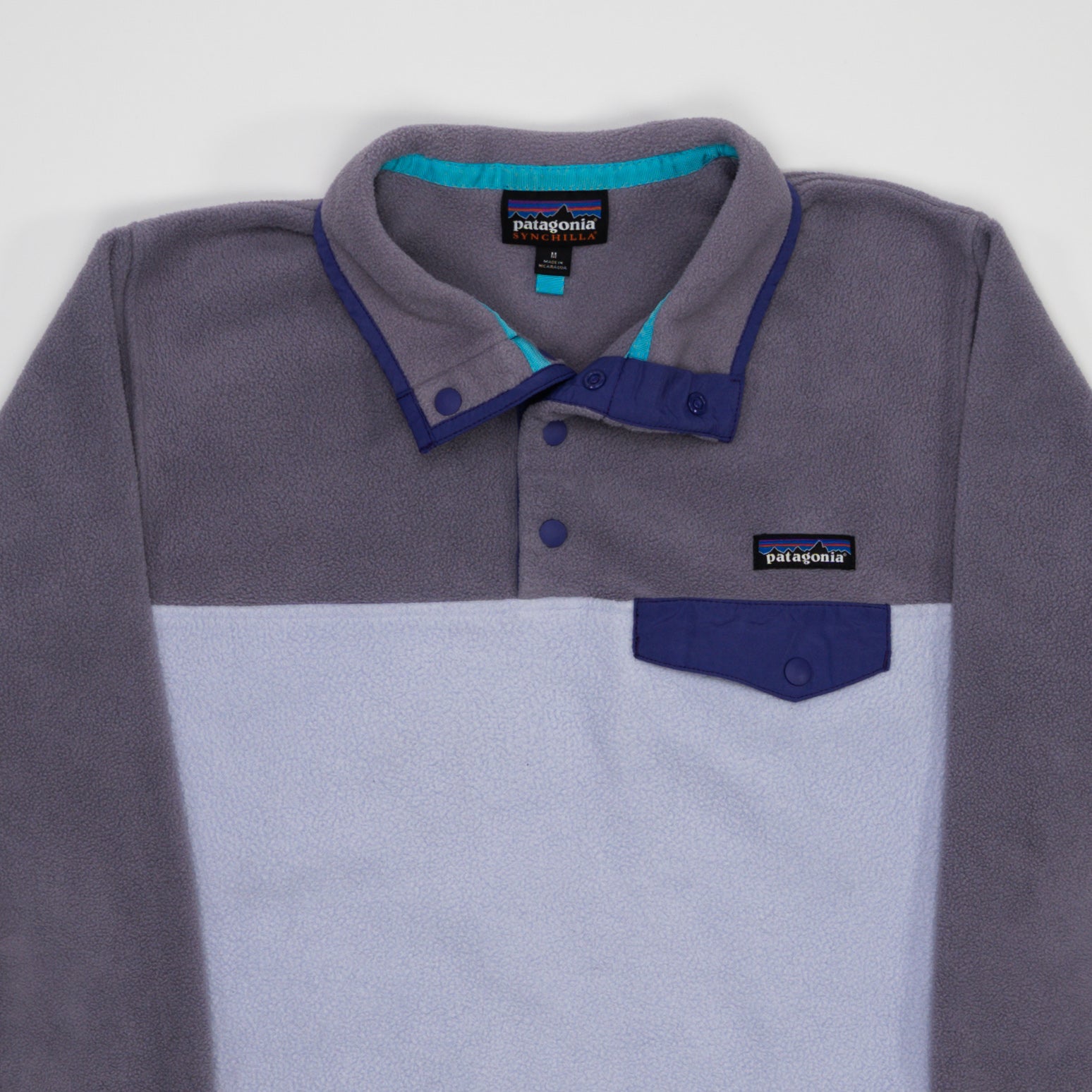 Vintage Light Purple Patagonia Fleece 1/4 Button Up Sweater (M) | Rebalance Vintage.