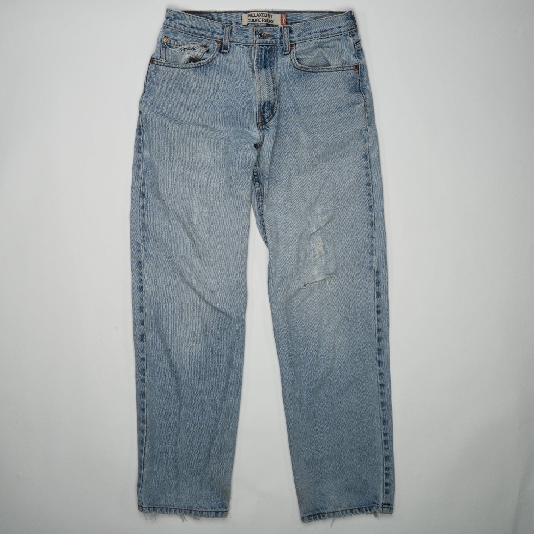 Vintage Light washed Ripped Levi Jeans (32 x 34) | Rebalance Vintage.