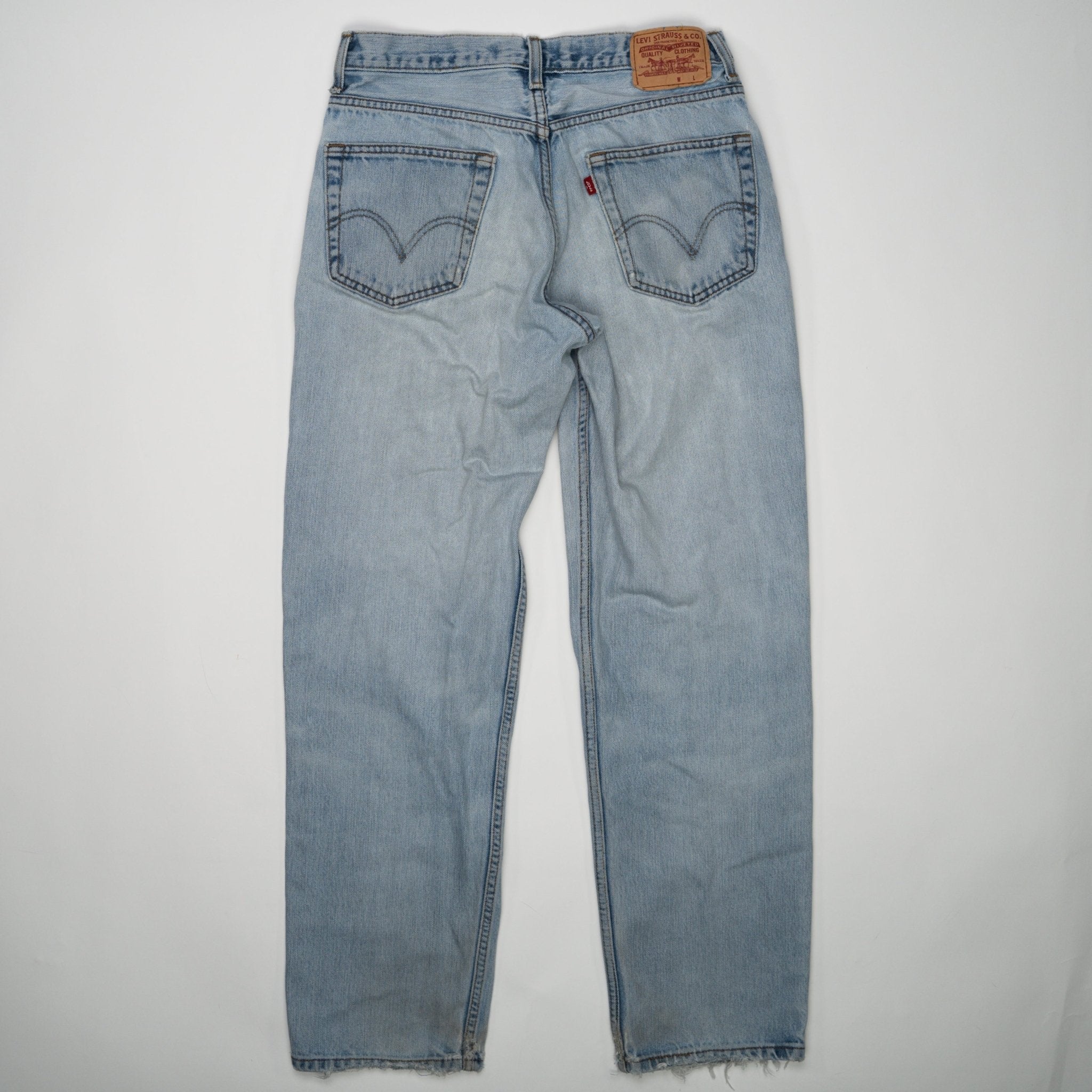 Vintage Light washed Ripped Levi Jeans (32 x 34) | Rebalance Vintage.