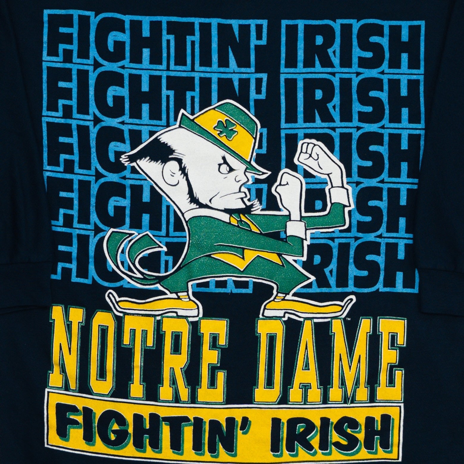 Vintage 90s Fighting Irish Notre Dame All Over Print Crewneck (M) | Rebalance Vintage.