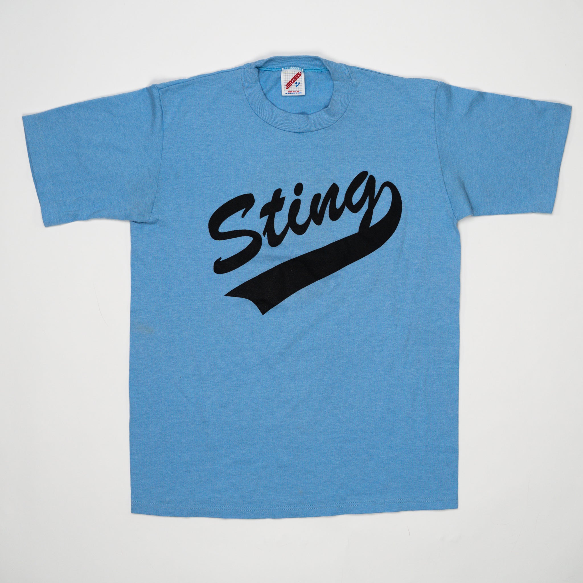 Vintage 80s Baby Blue Sting Tee (S) | Rebalance Vintage.