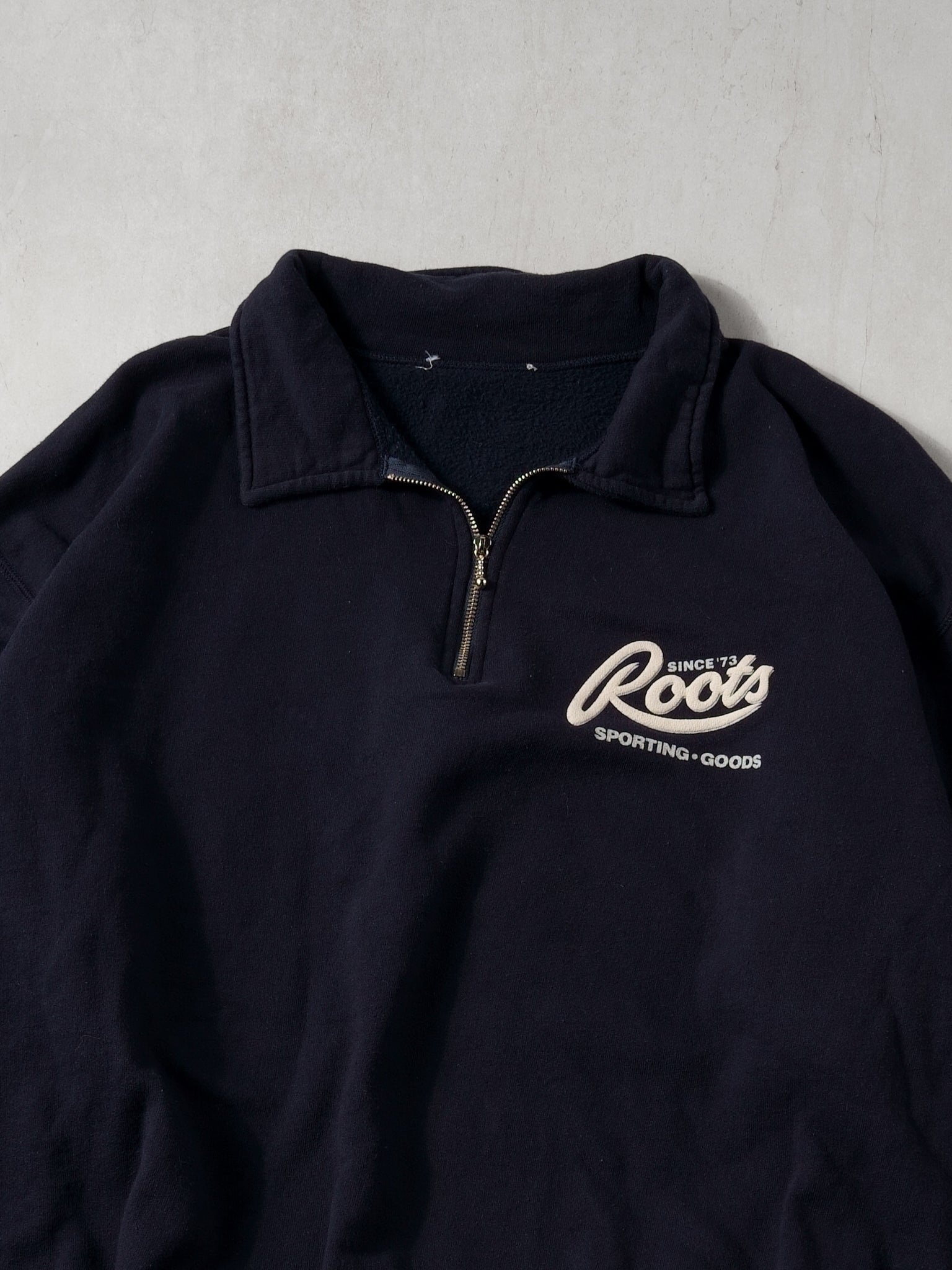Vintage 90s Faded Navy Roots Sporting Goods Collared 1/4 Crewneck (XL)