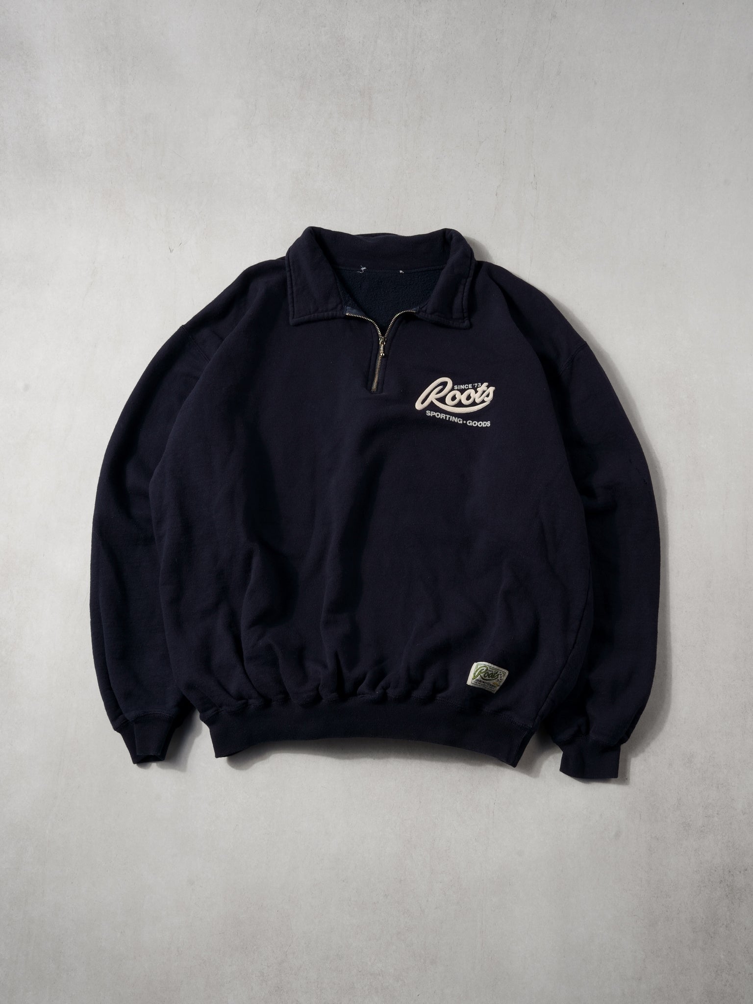 Vintage 90s Faded Navy Roots Sporting Goods Collared 1/4 Crewneck (XL)