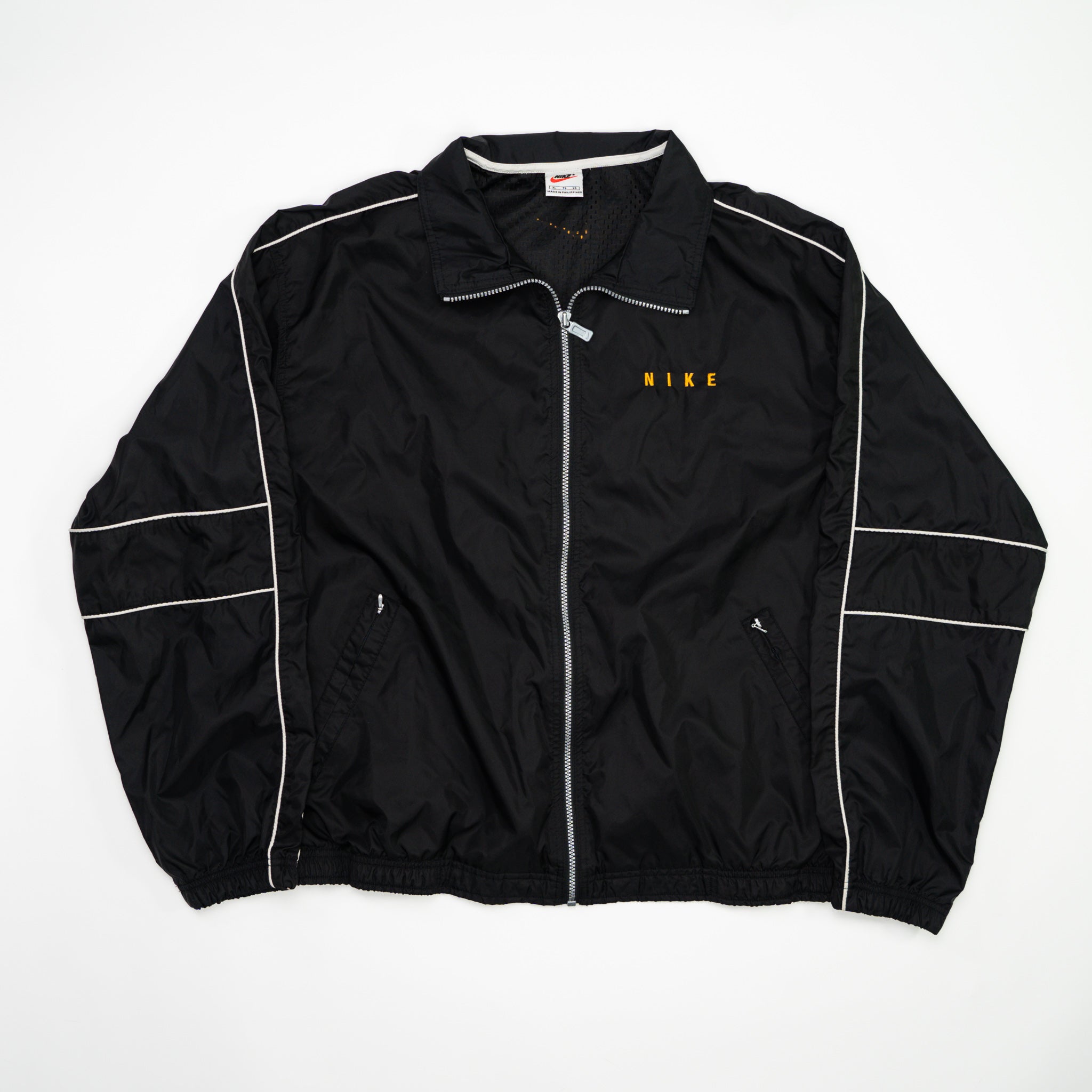 Vintage Black + Orange Nike Spell Out Windbreaker (XL) | Rebalance Vintage.
