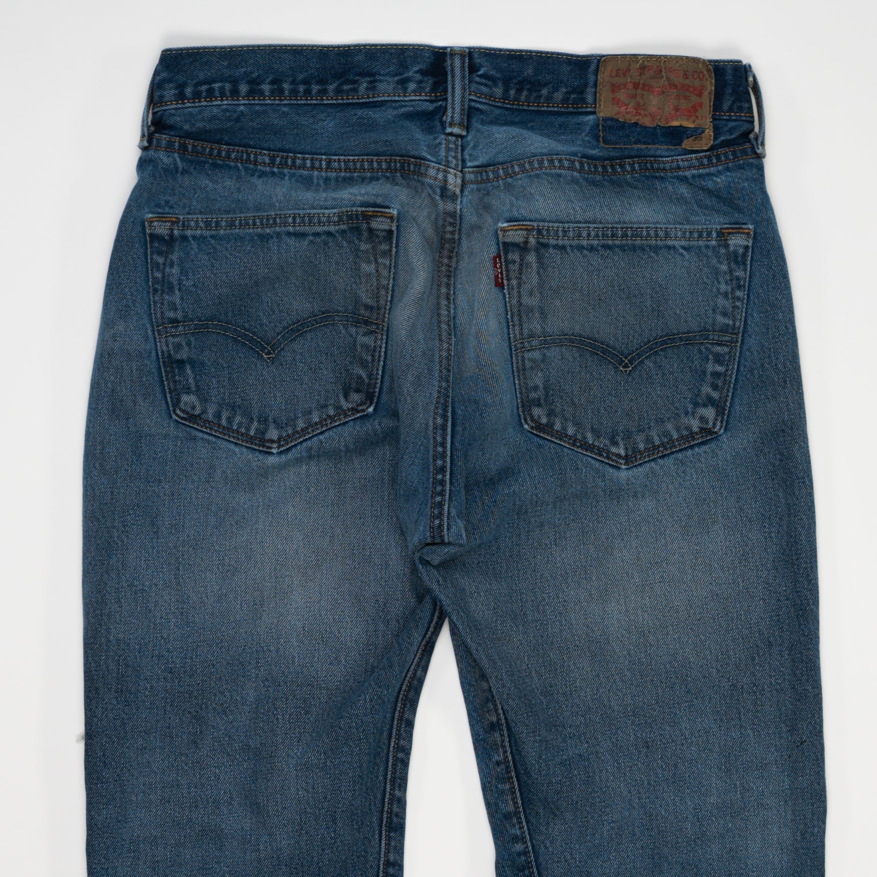 Vintage Dark Blue Ripped Levi Jeans (30 x 28) | Rebalance Vintage.