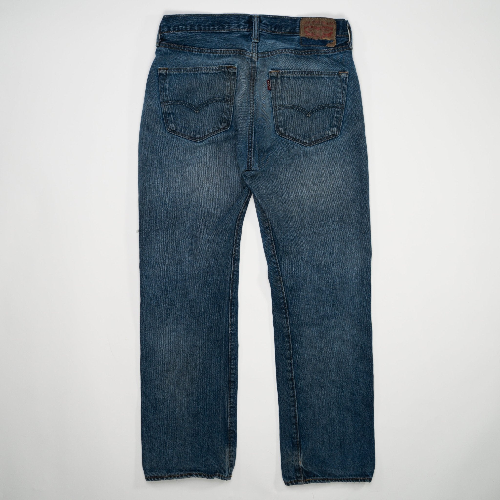 Vintage Dark Blue Ripped Levi Jeans (30 x 28) | Rebalance Vintage.