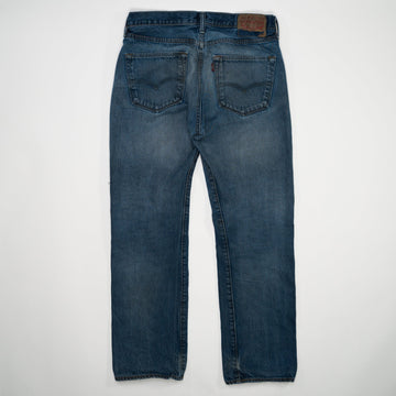 Vintage Dark Blue Ripped Levi Jeans (30 x 28) | Rebalance Vintage.