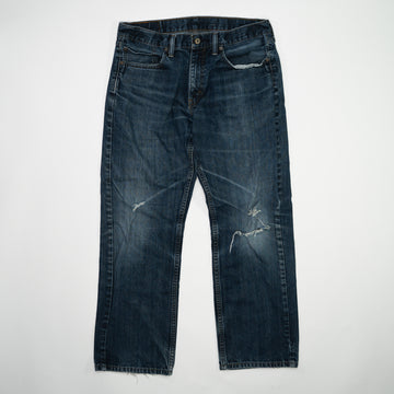 Vintage Dark Blue Levi 559 Jeans w/ Rips (34 x 30) | Rebalance Vintage.