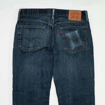 Vintage Dark Blue Levi 559 Jeans w/ Rips (34 x 30) | Rebalance Vintage.