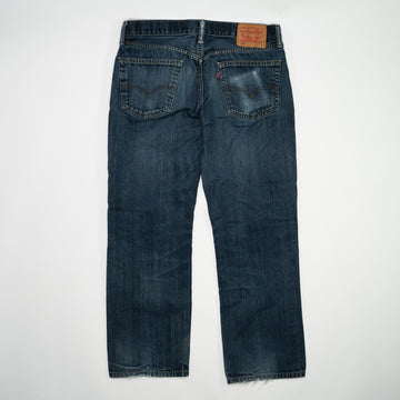 Vintage Dark Blue Levi 559 Jeans w/ Rips (34 x 30) | Rebalance Vintage.
