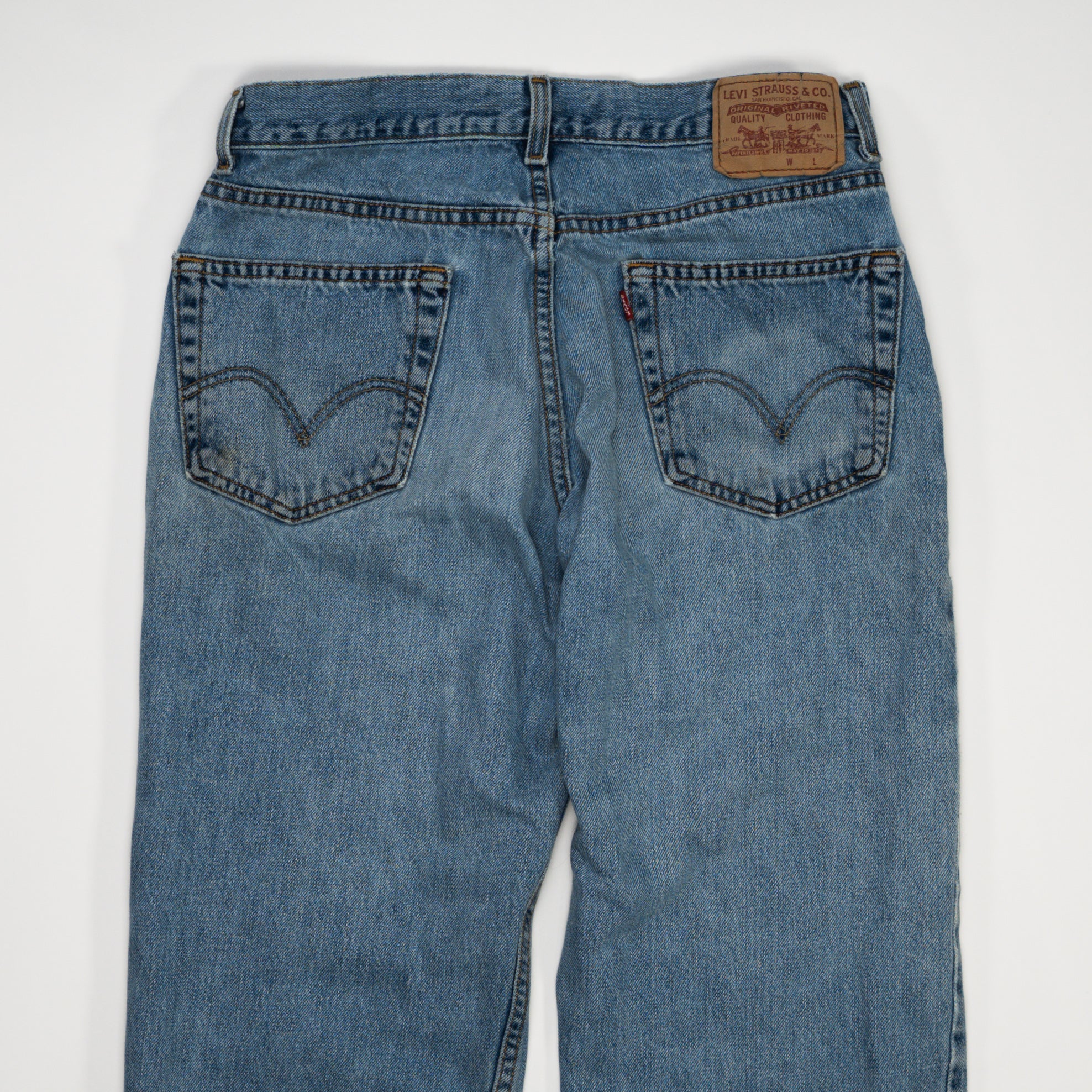 Vintage Blue Levi 550 w/ Rips (33 x 32) | Rebalance Vintage.