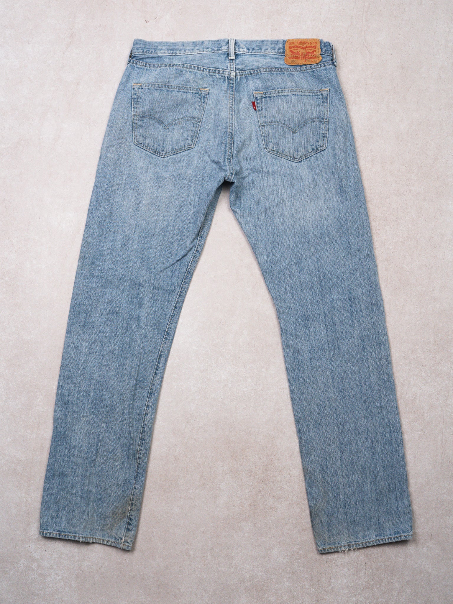 Vintage Light Blue 501 Levi Jeans w/ rip (34 x 32)