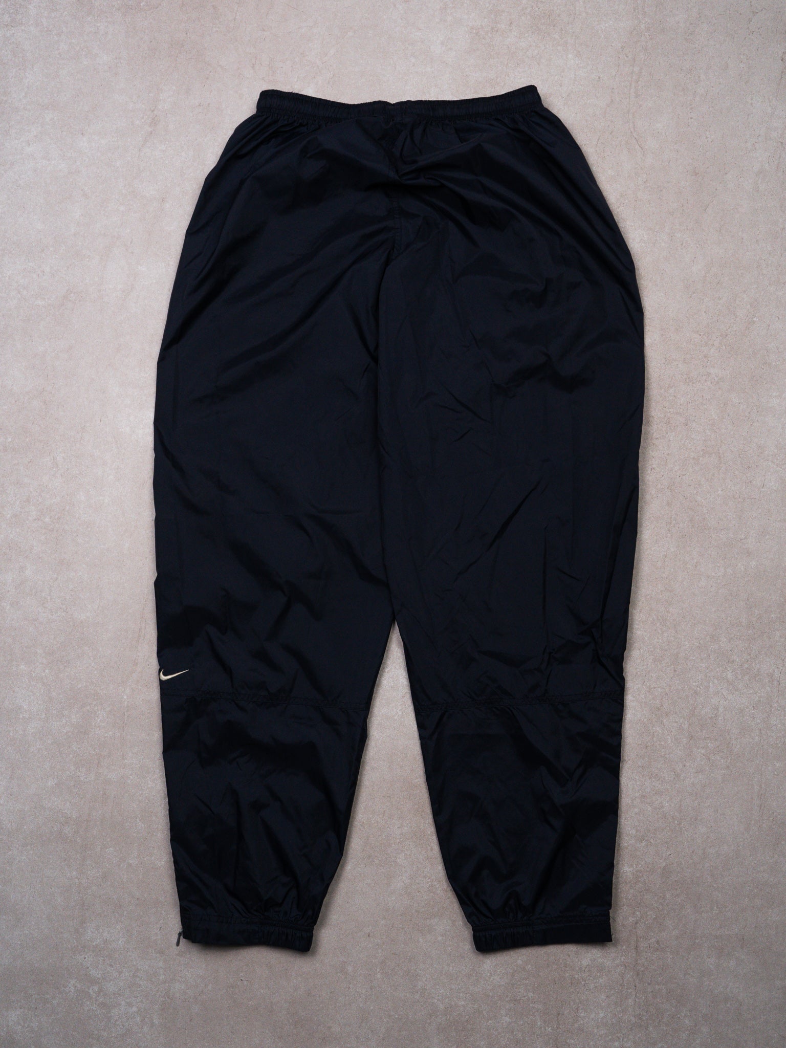 Vintage Nike Navy + White Windbreaker Swoosh Pants (30-33W x 33L)