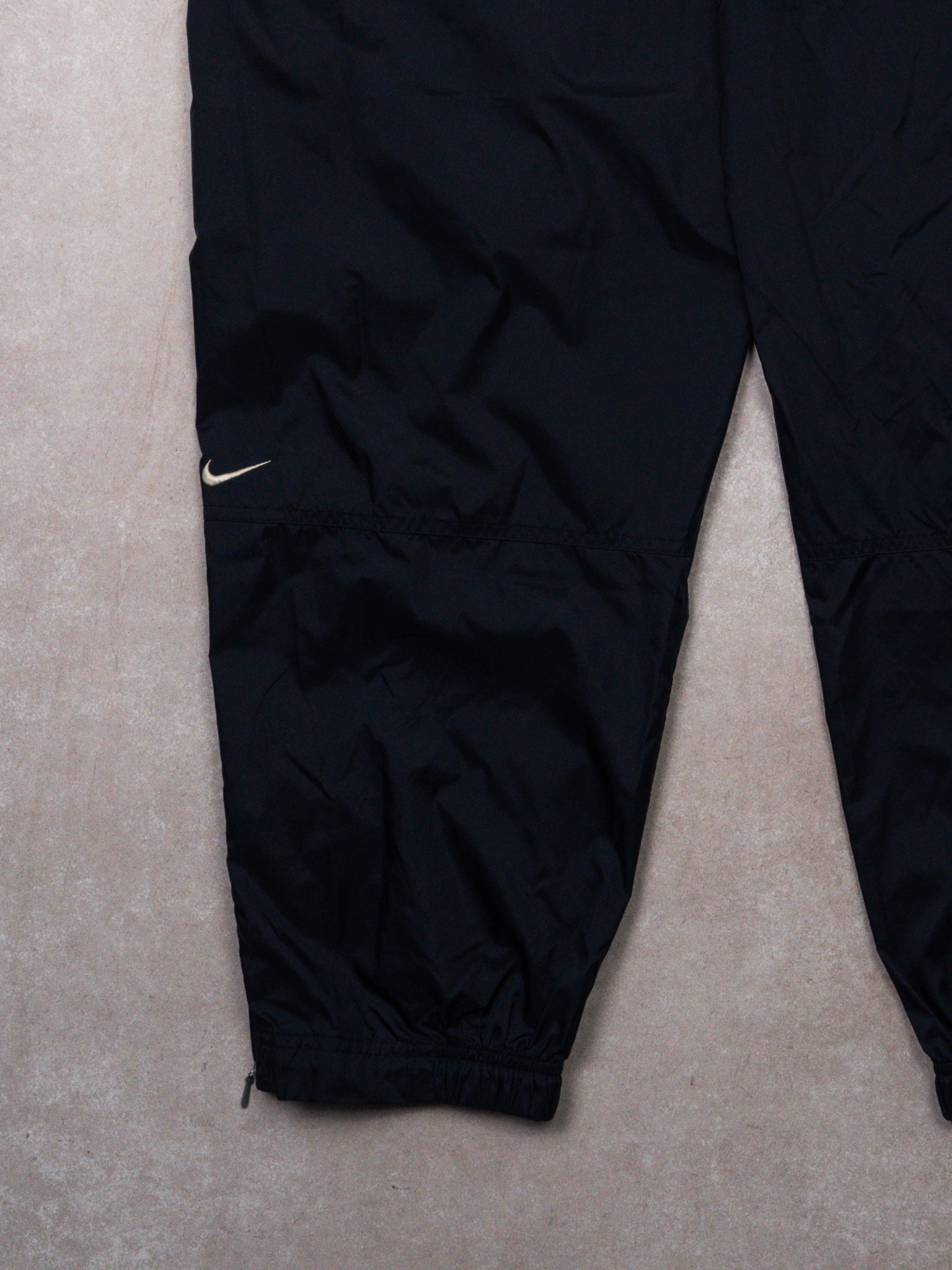 Vintage Nike Navy + White Windbreaker Swoosh Pants (30-33W x 33L)