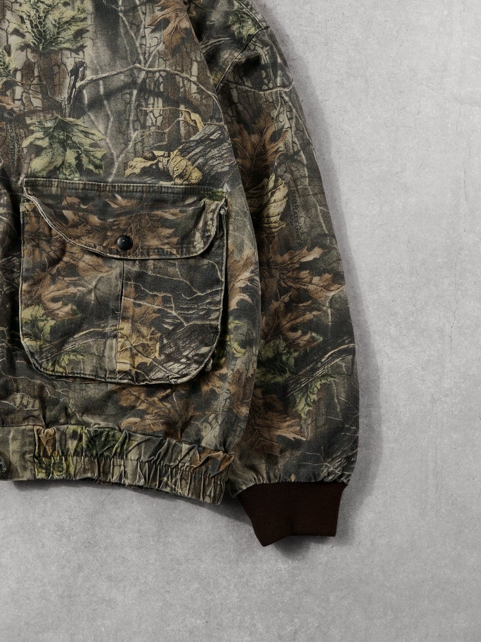 Vintage 90s Realtree America's Best Buy Tail Crest Camo Jacket (L/XL)