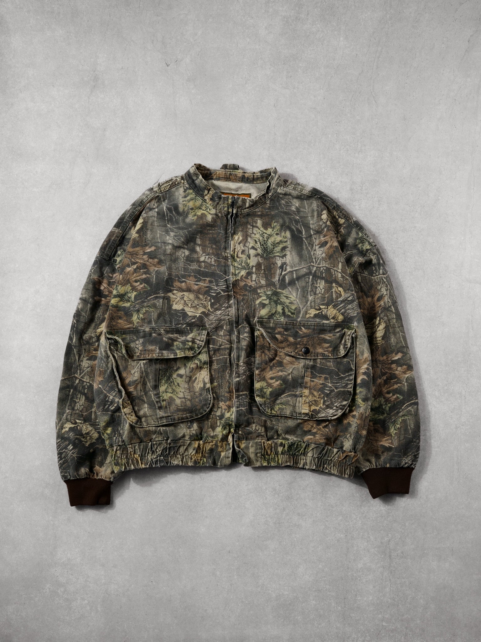 Vintage 90s Realtree America's Best Buy Tail Crest Camo Jacket (L/XL)