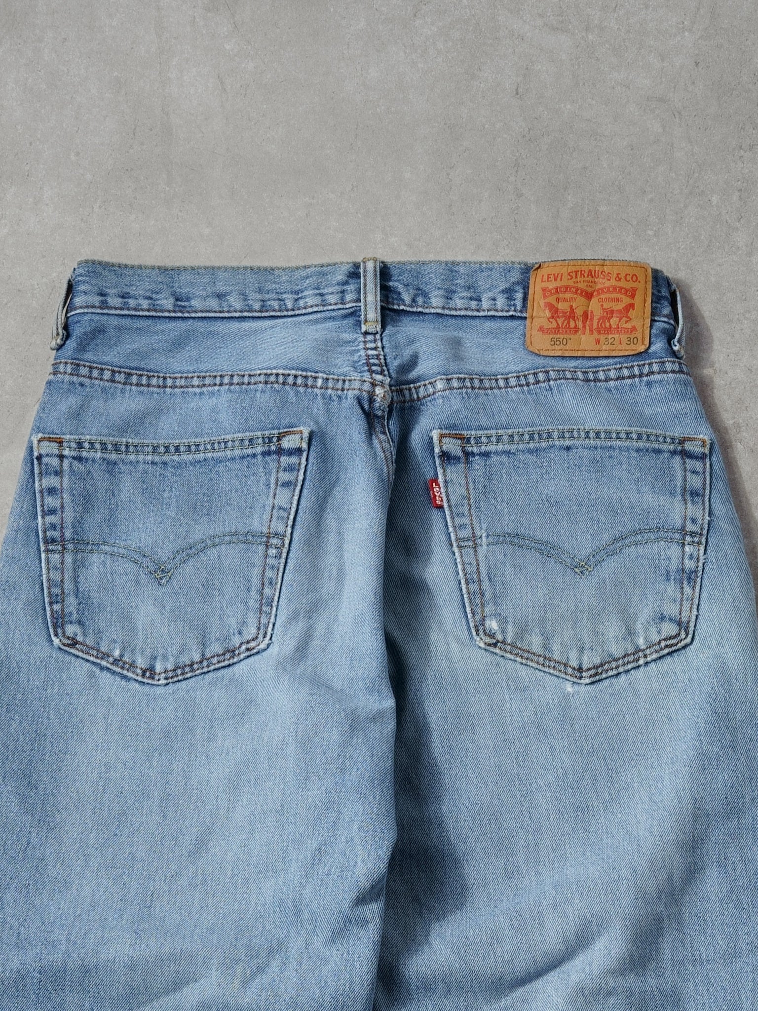 Vintage 90s Light Washed Levi's 550 Denim Jeans (32x29)