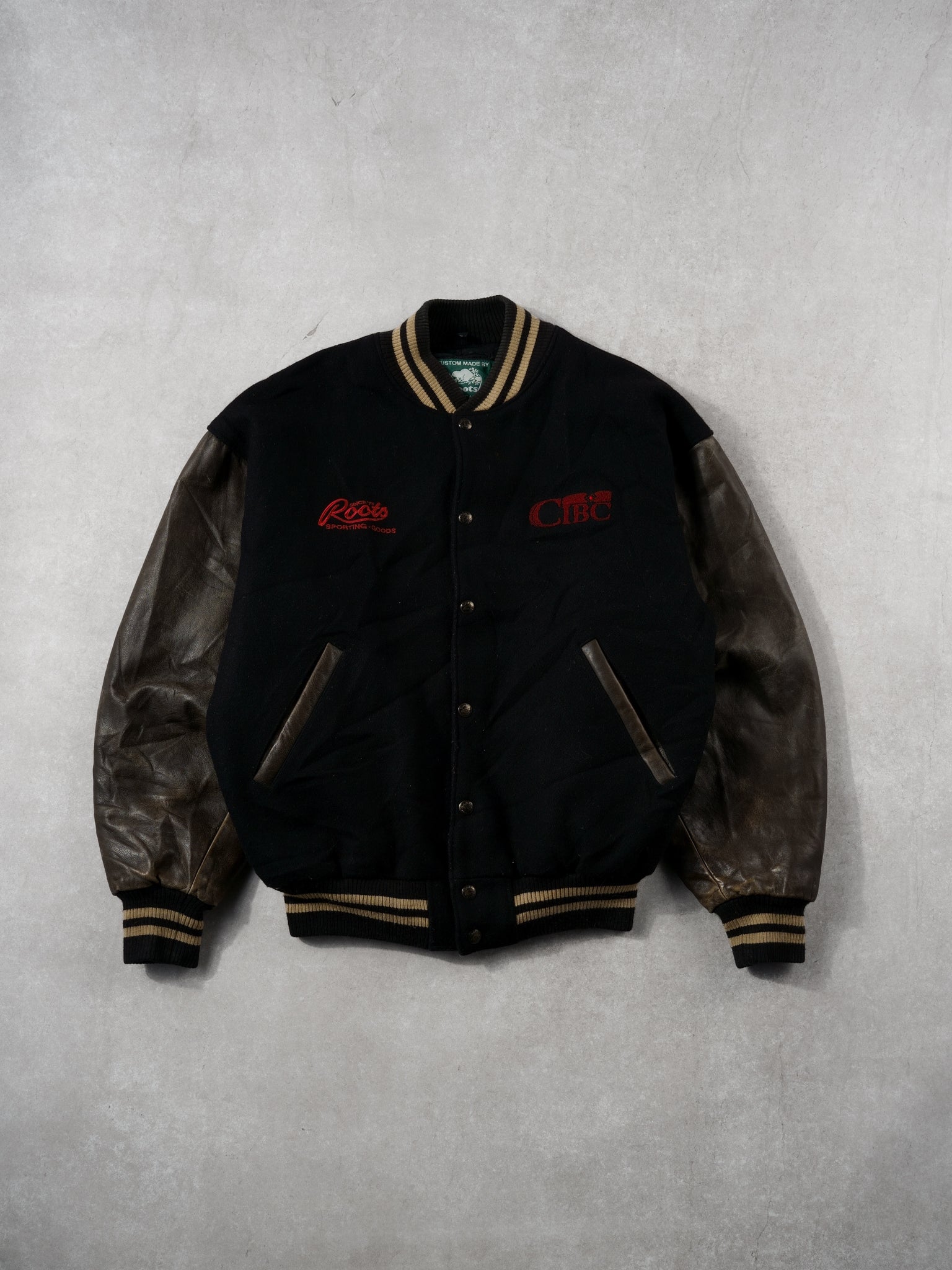 Vintage 90s Black and Brown Roots x CIBC Varsity Jacket (M)
