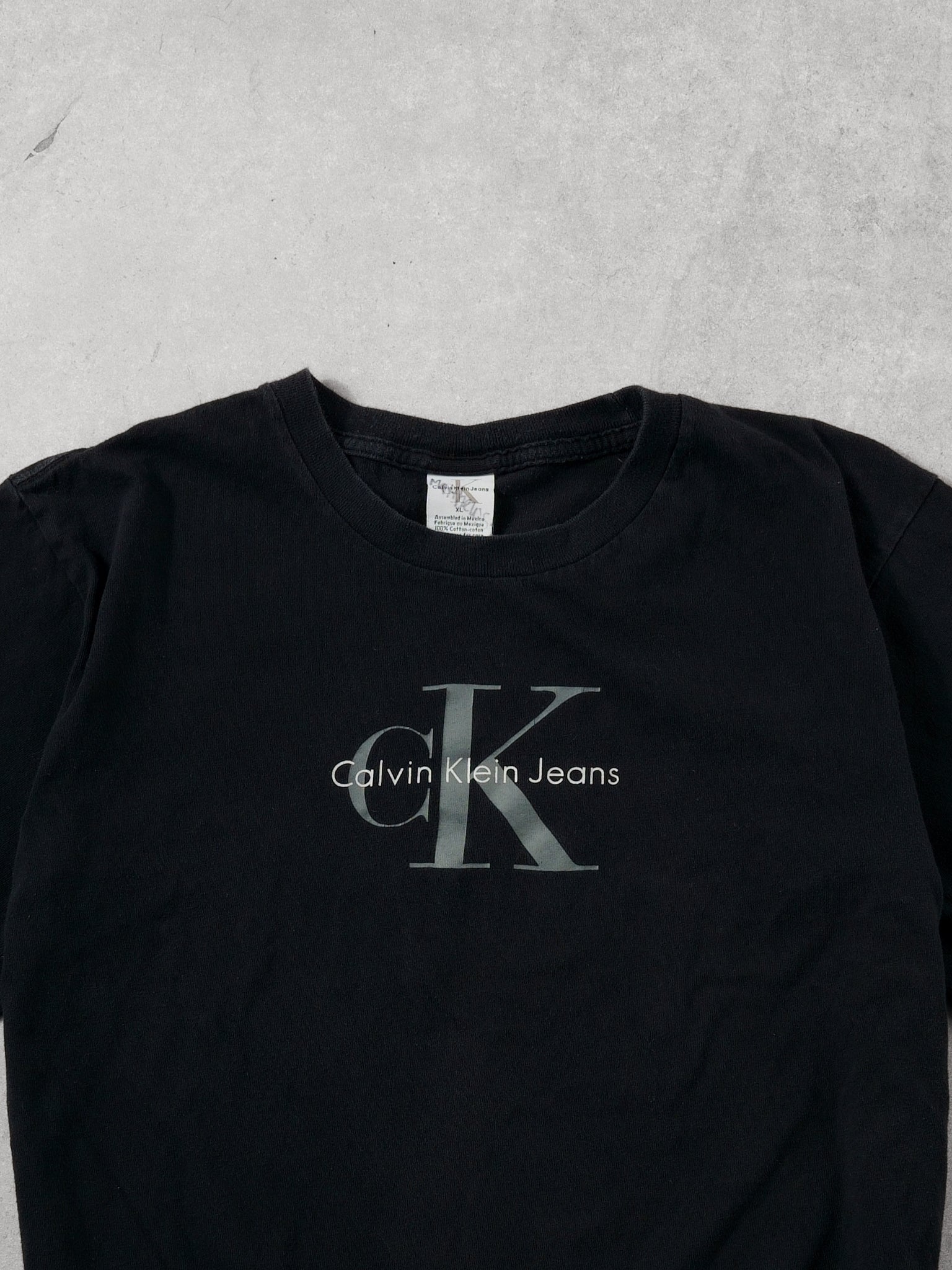 Vintage 90s Washed Black Clavin Klein Graphic Tee (M)
