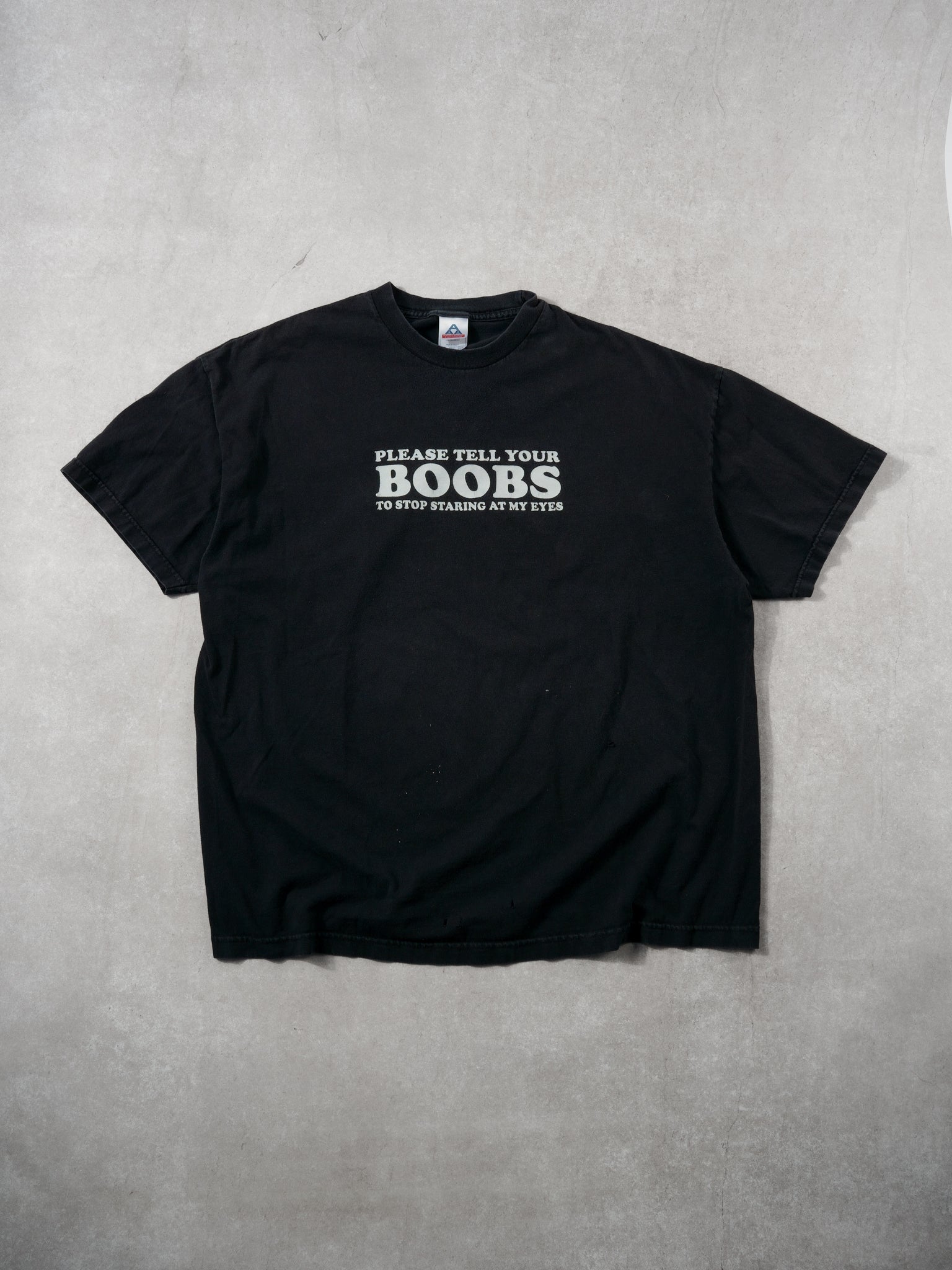 Vintage 90s Black "Please tell your boobs to stop staring at my eyes" Tee (L/XL)