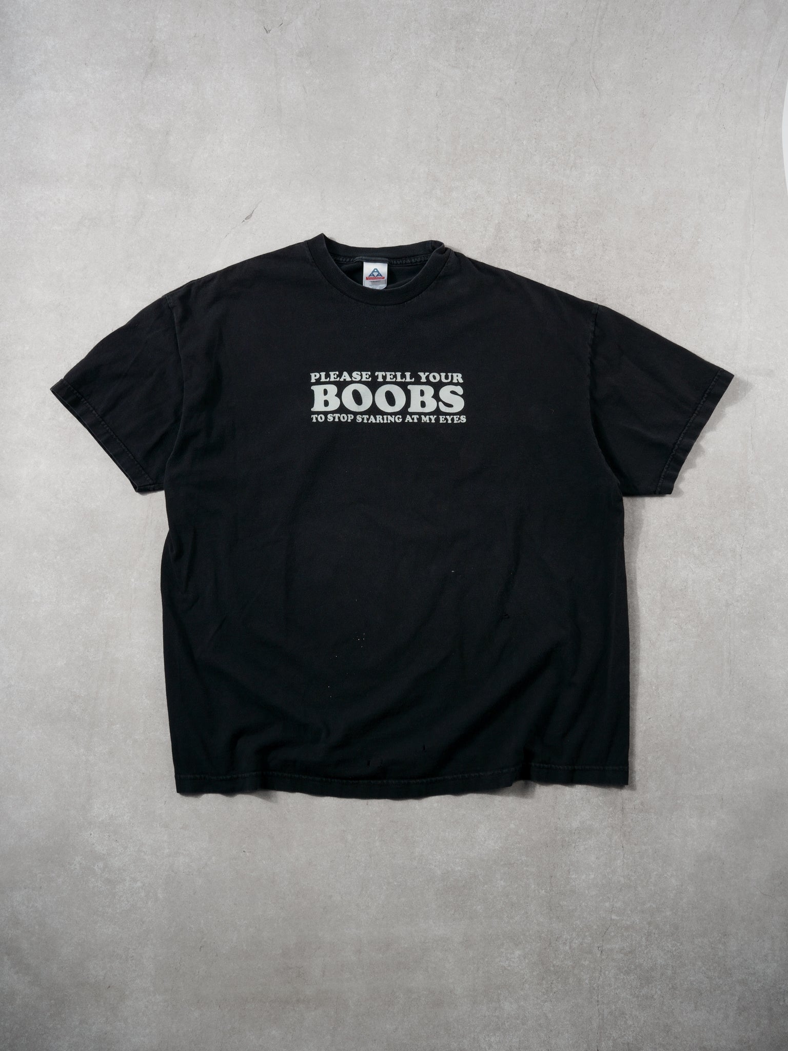 Vintage 90s Black "Please tell your boobs to stop staring at my eyes" Tee (L/XL)
