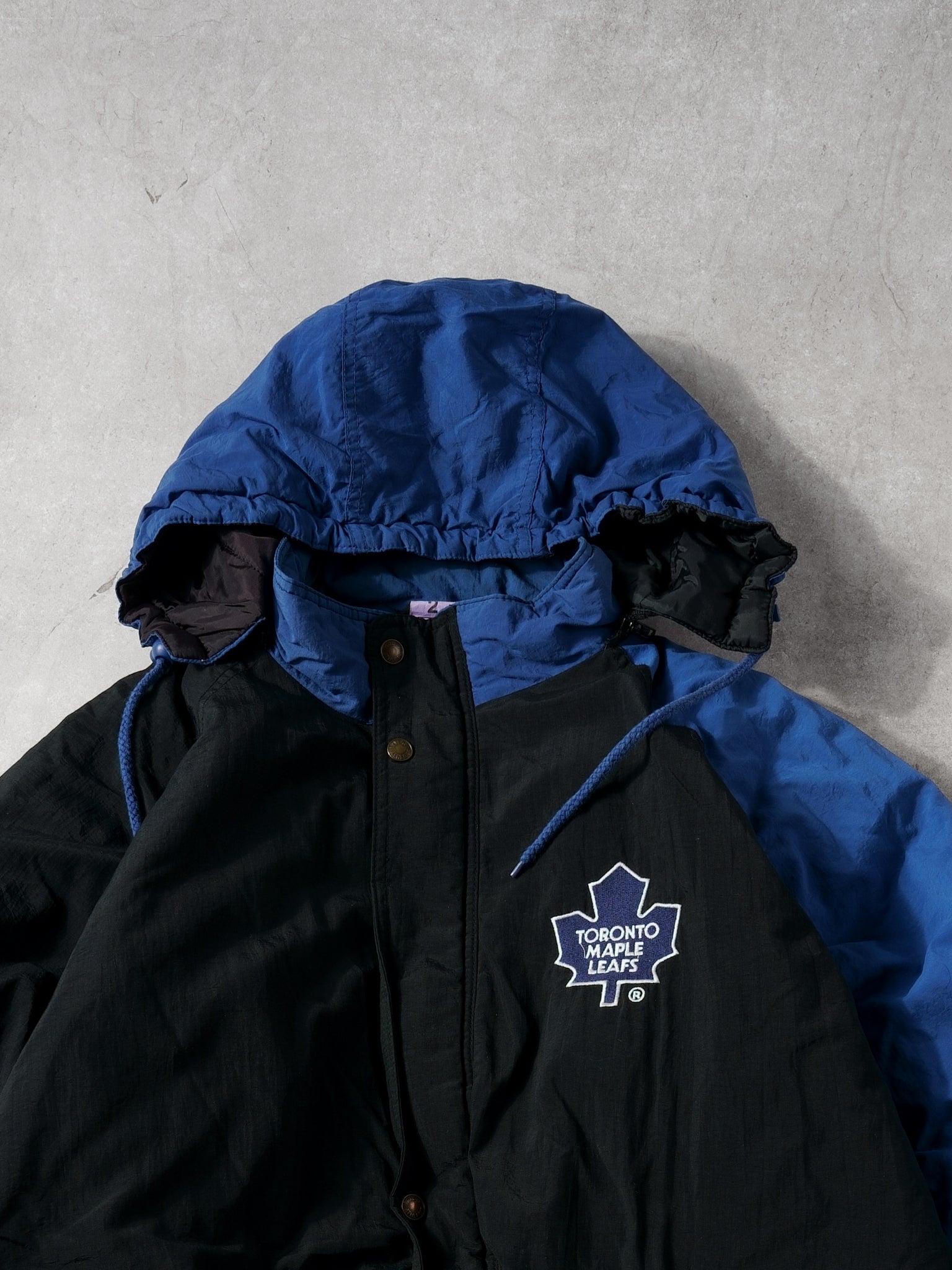 Vintage 90s Blue and Black Toronto Maple Leafs Hooded Jacket (XL)