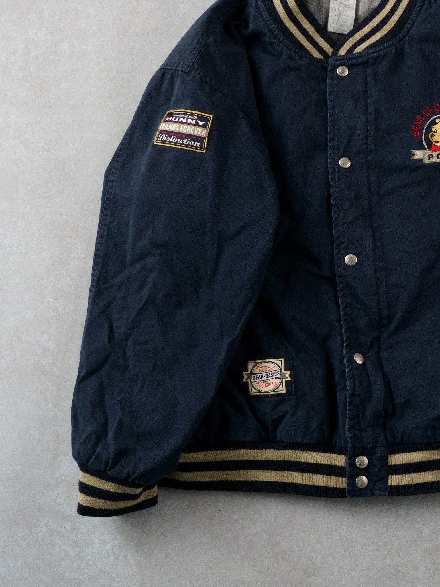Vintage 90s Navy Blue Walt Disney Winnie The Pooh Bear Essentials Bomber (M/L)
