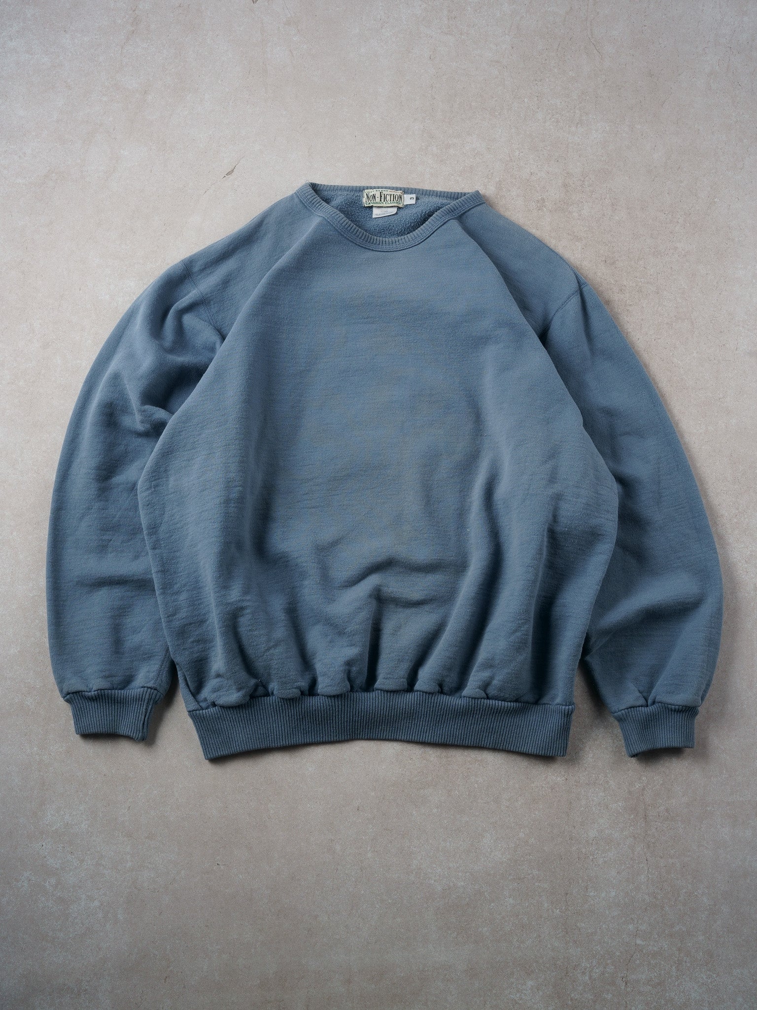 Vintage 90s Faded Baby Blue Non Fiction Blank Crewneck (L)