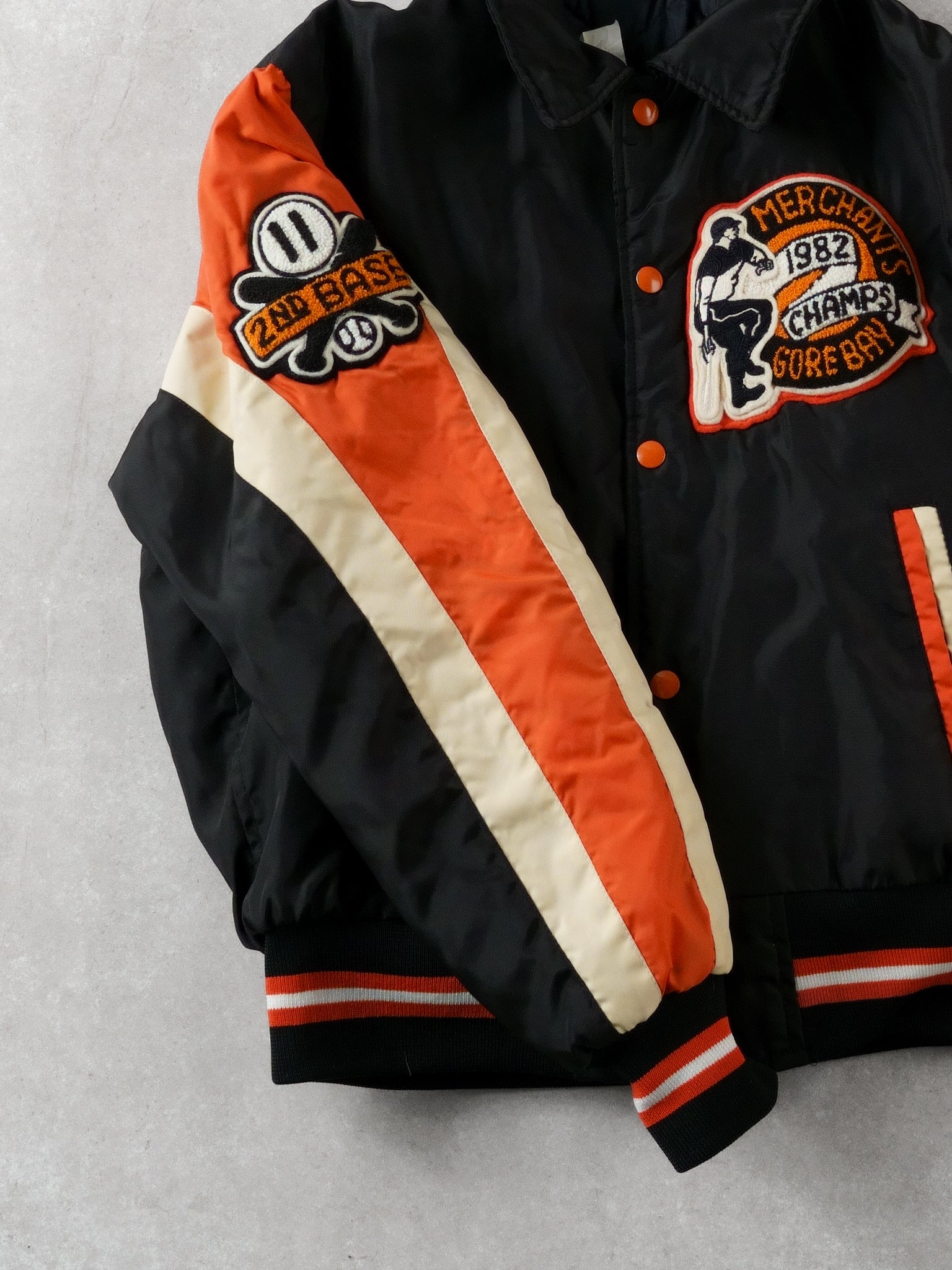 Vintage 82' Black and Orange Merchants Gorebays Champs Baseball Bomber (S/M)