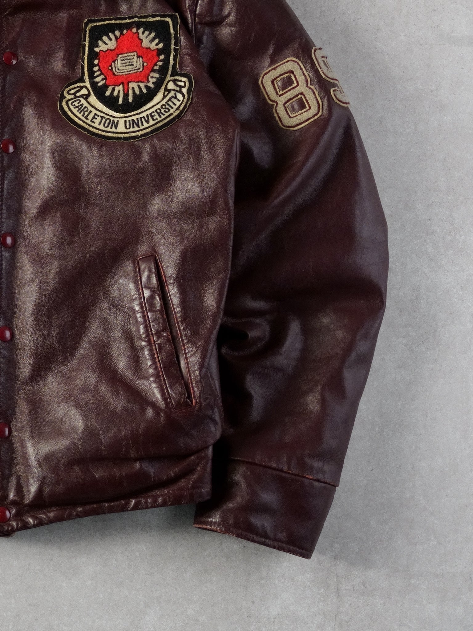 Vintage 89' Maroon Carleton University Emblem Collared Leather Jacket (M/L)