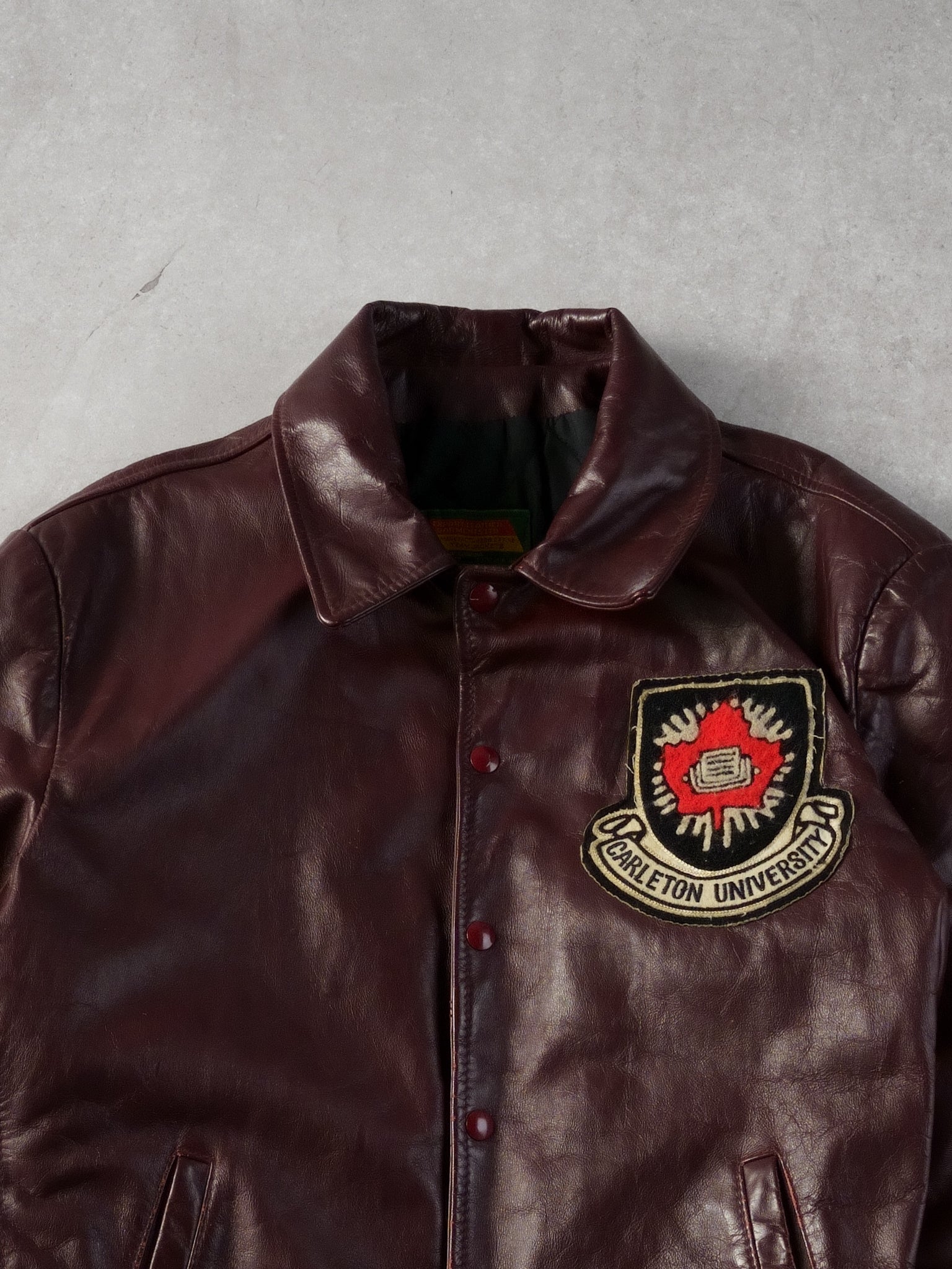 Vintage 89' Maroon Carleton University Emblem Collared Leather Jacket (M/L)