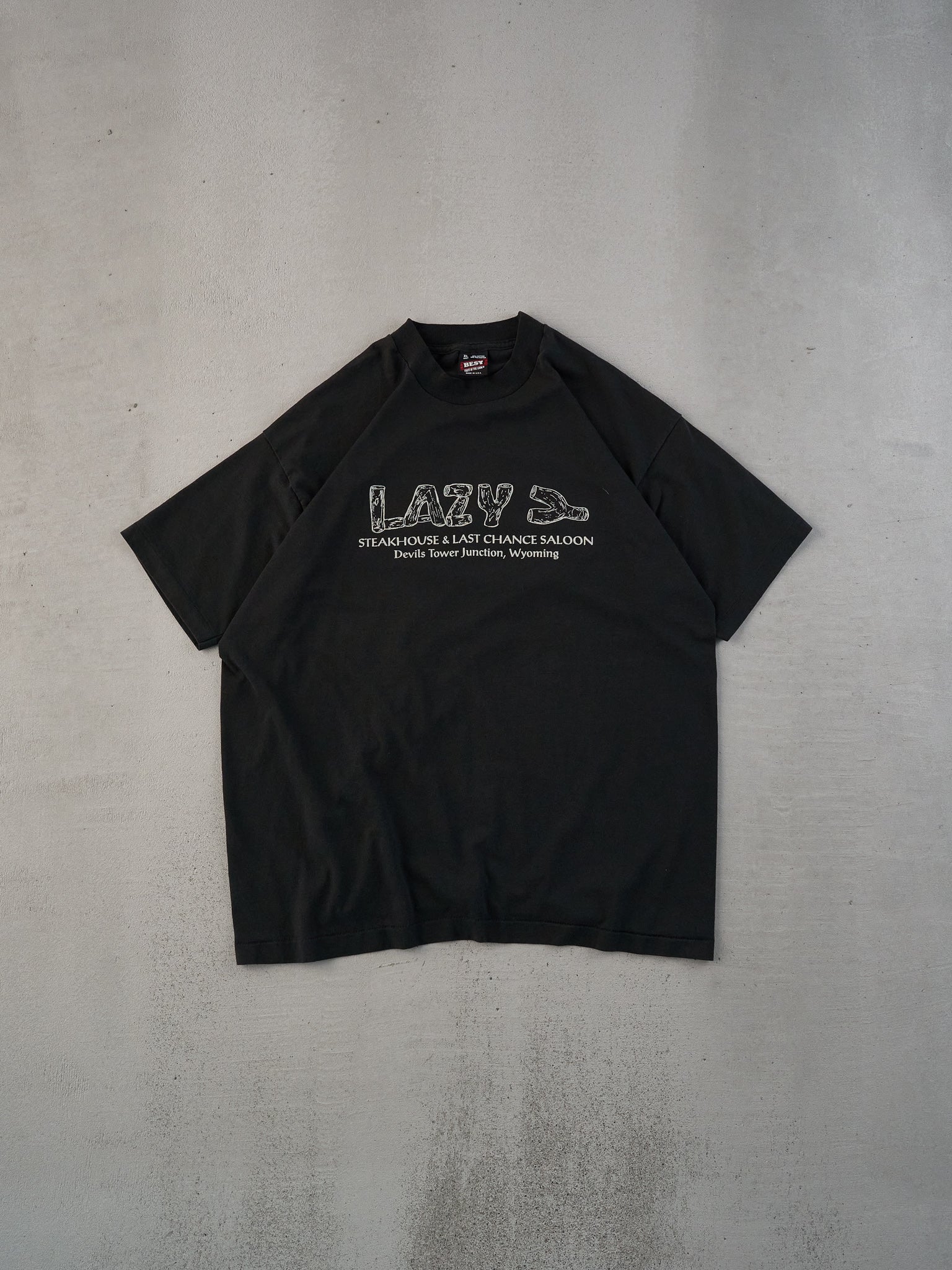 Vintage 90s Black Single Stitched "Famous For Nothing But We Have Towering Good Food" Tee (M/L)