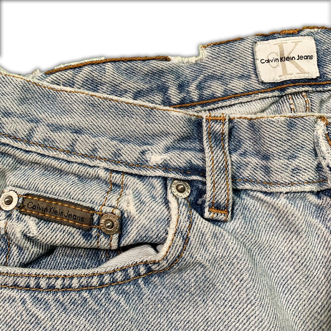 Vintage 90s High Waisted Light Washed Calvin Klein Jeans | Rebalance Vintage.