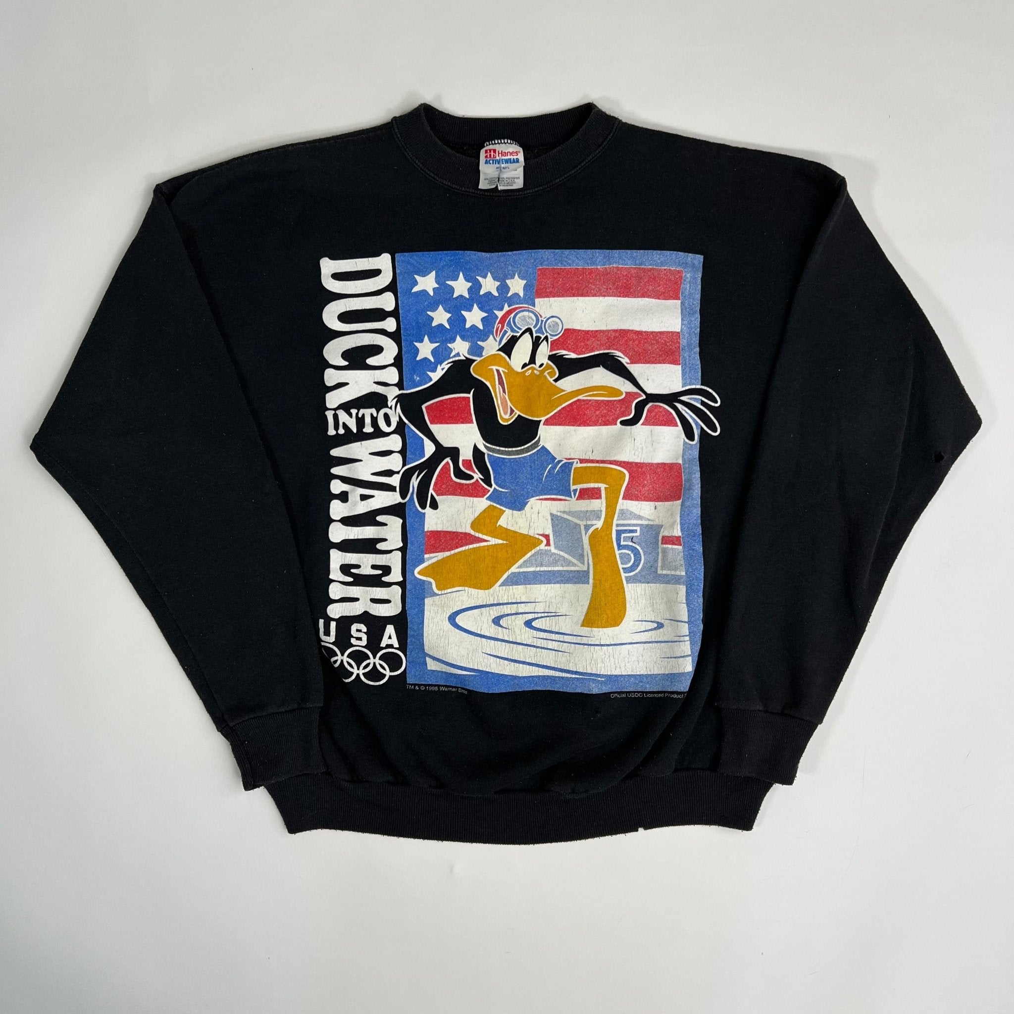 Vintage 90s Daffy Duck into Water WB Olympic Crewneck (M/L) | Rebalance Vintage.