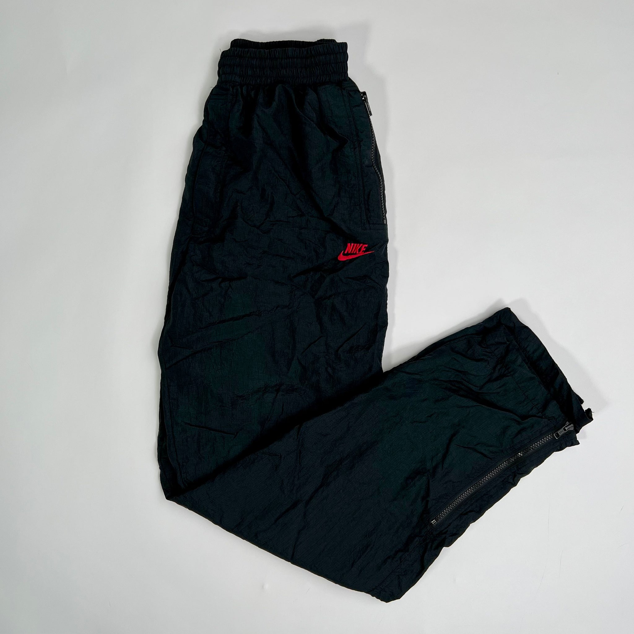 Vintage Black + Red Nike Windbreaker Pants (L) | Rebalance Vintage.