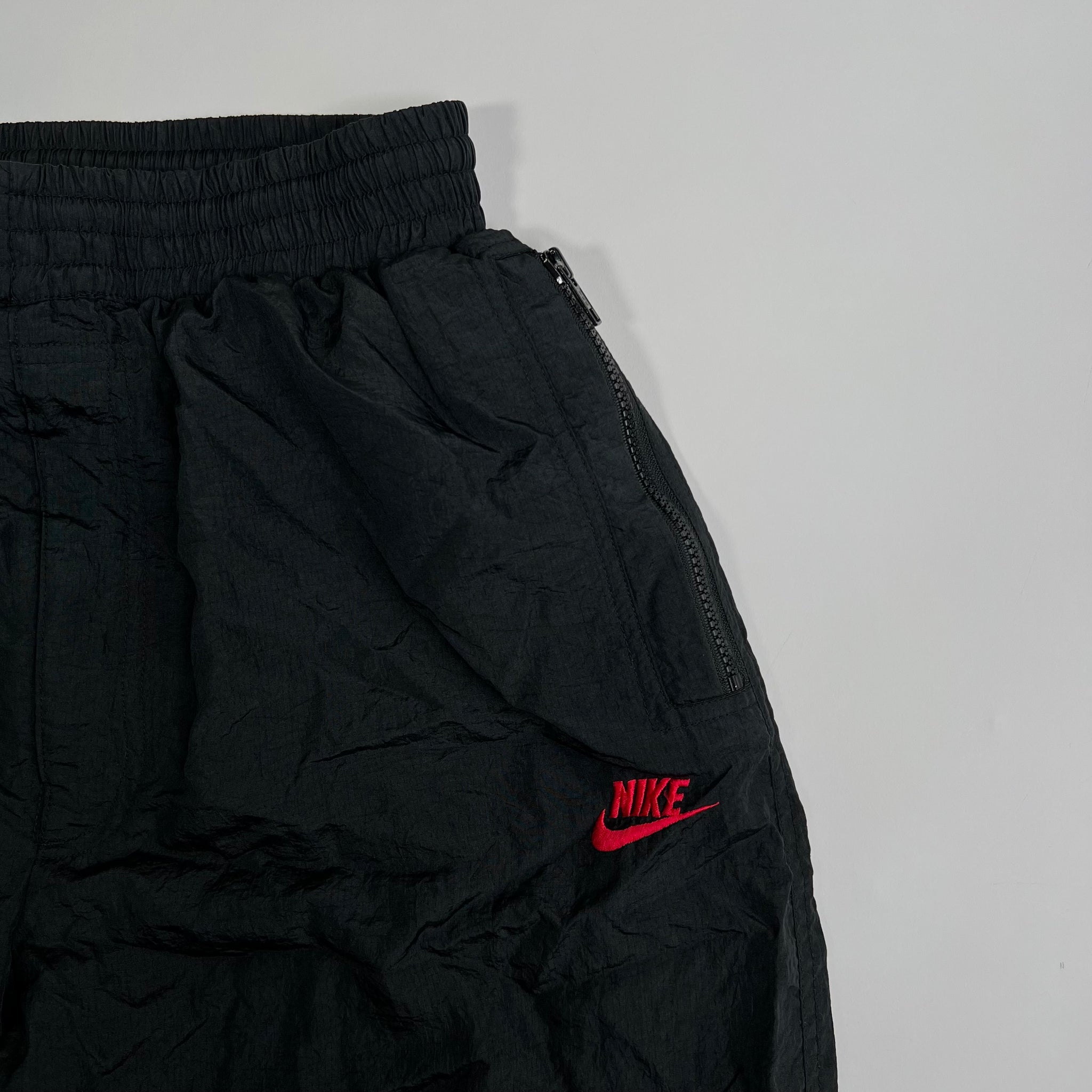 Vintage Black + Red Nike Windbreaker Pants (L) | Rebalance Vintage.