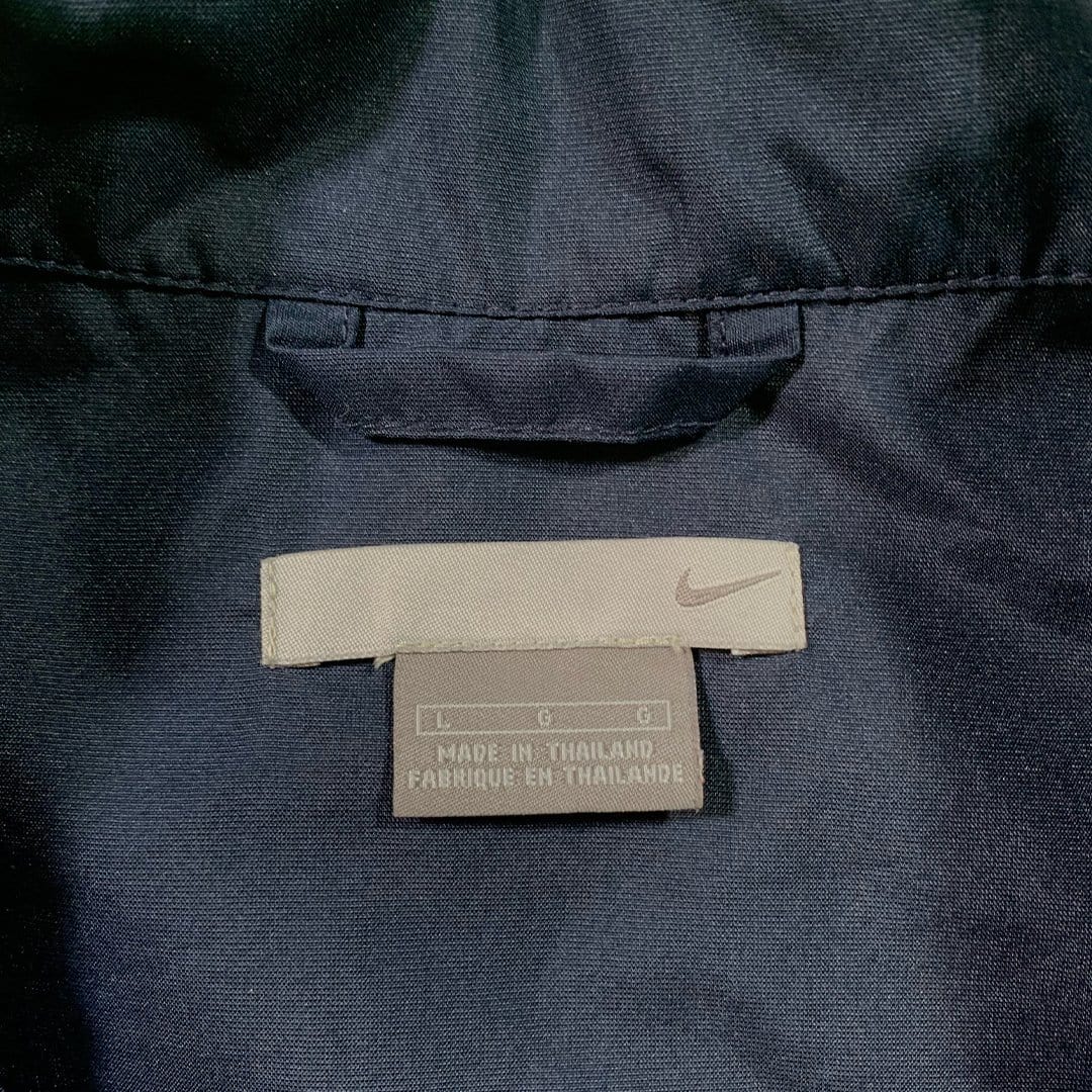 Vintage 00's Blue + White Nike Windbreaker | Rebalance Vintage.