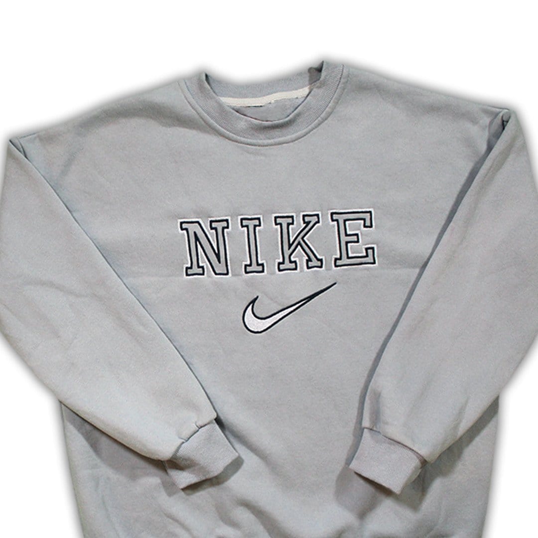 Vintage 90s Bootleg Nike Baby Blue Spell Out Crewneck | Rebalance Vintage.