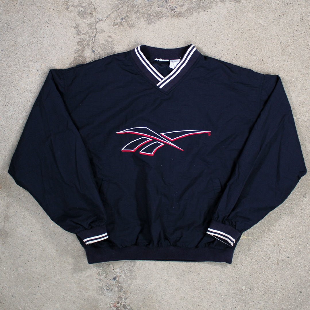 Vintage 90s Blue, red + White Reebok Pullover Windbreaker (L/XL) | Rebalance Vintage.