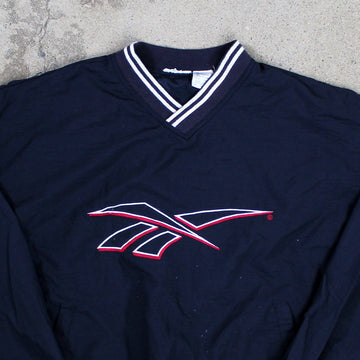 Vintage 90s Blue, red + White Reebok Pullover Windbreaker (L/XL) | Rebalance Vintage.